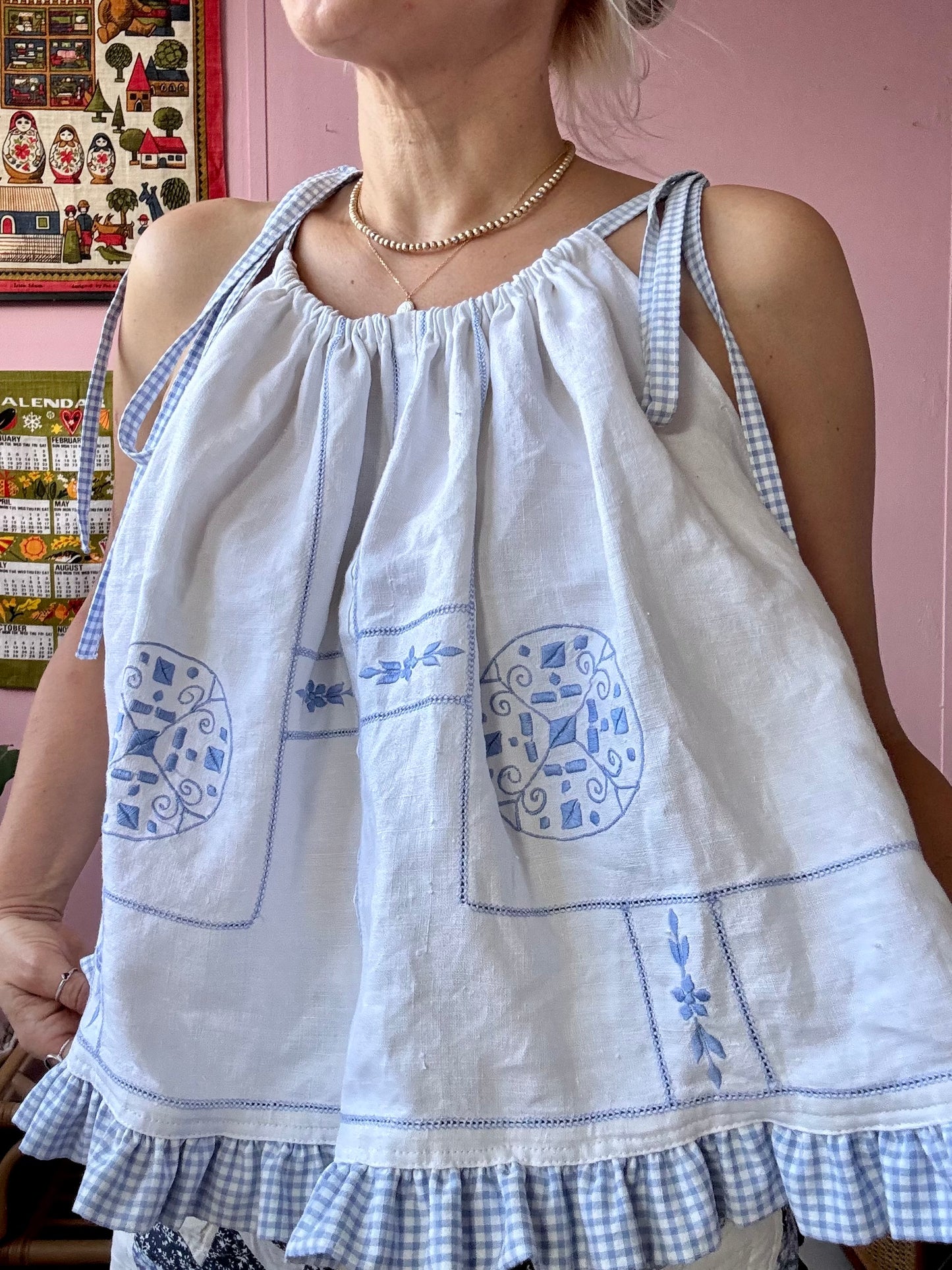 White linen top with blue gingham frill