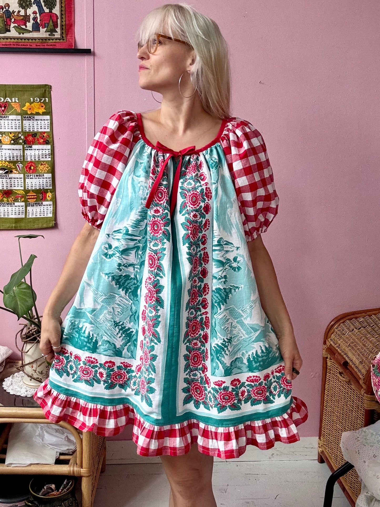 Vintage Tyrol village and red gingham dress