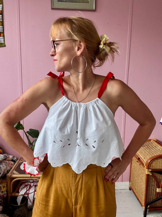 All white top with red straps