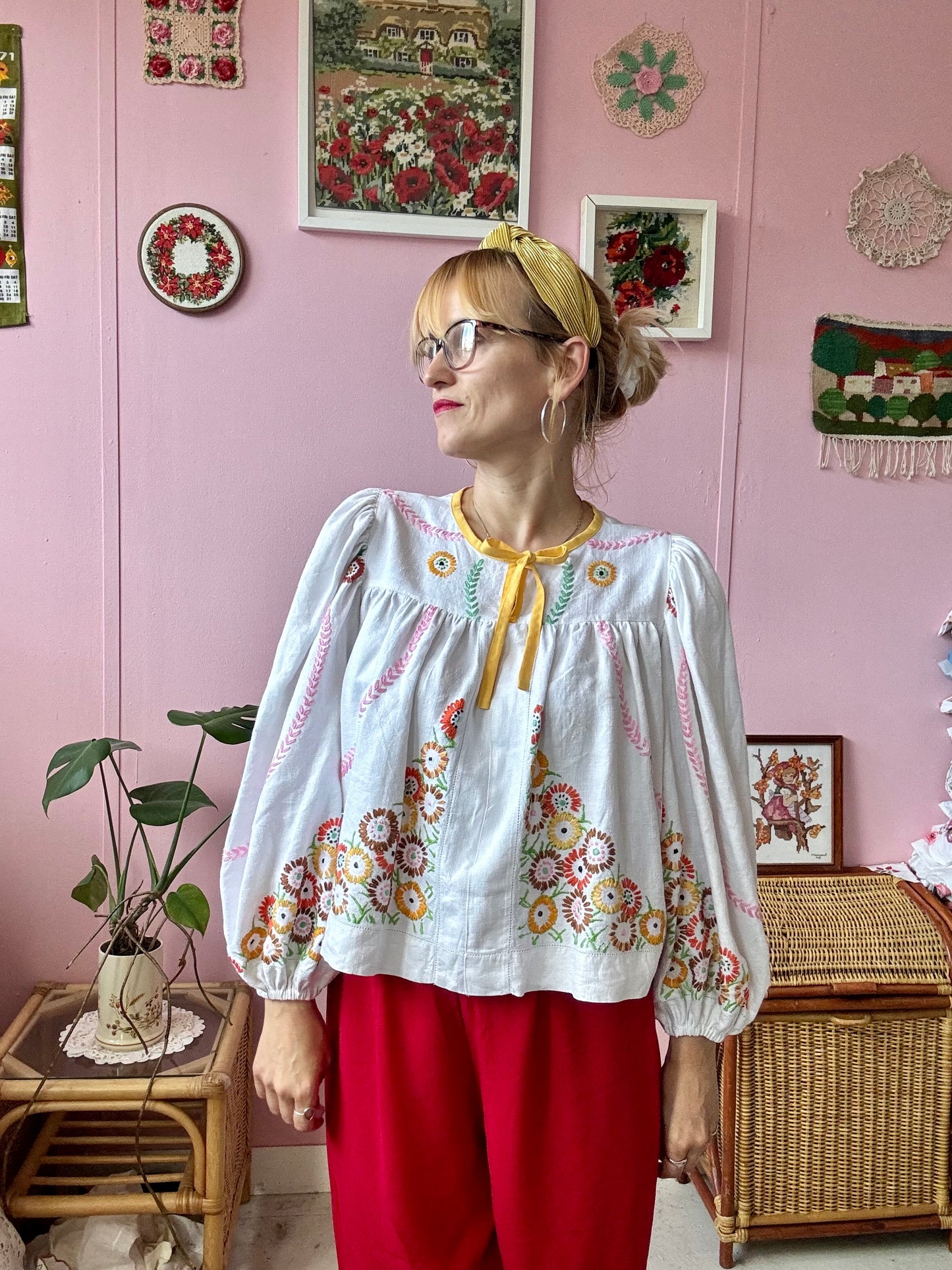 Linen blouse with floral embroidery and yellow binding