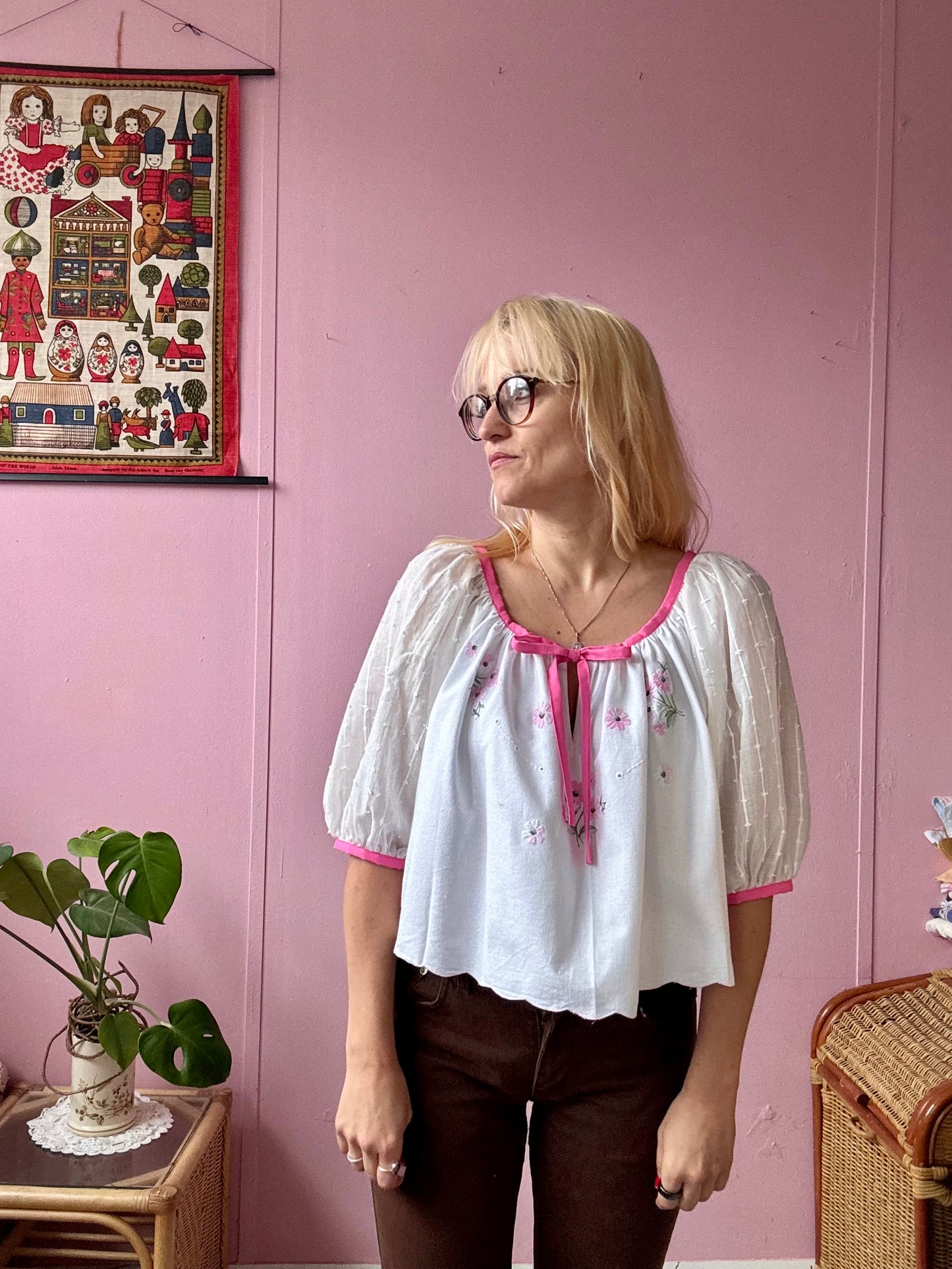 White blouse with pink binding