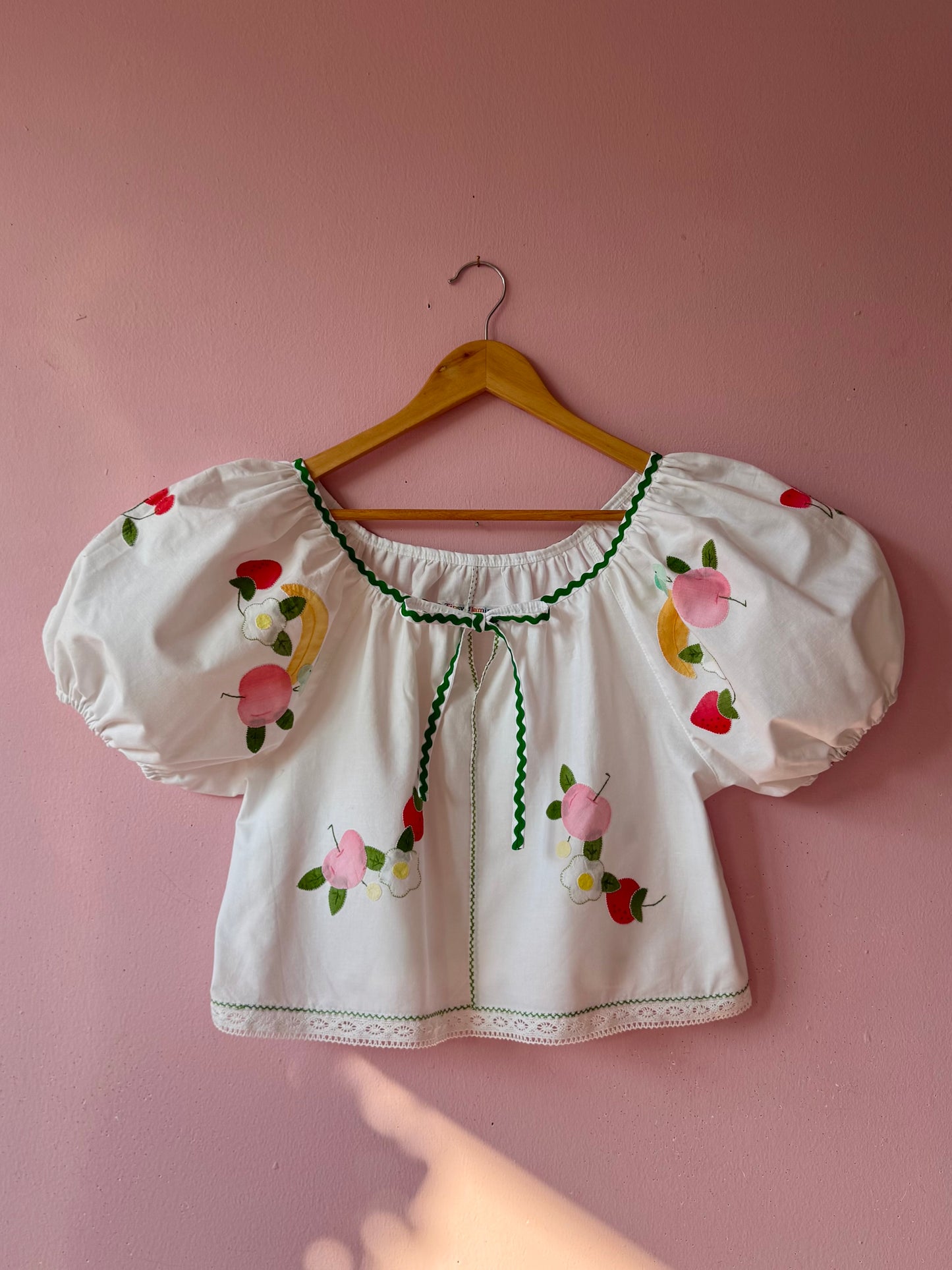 Fruity blouse with green ric rac