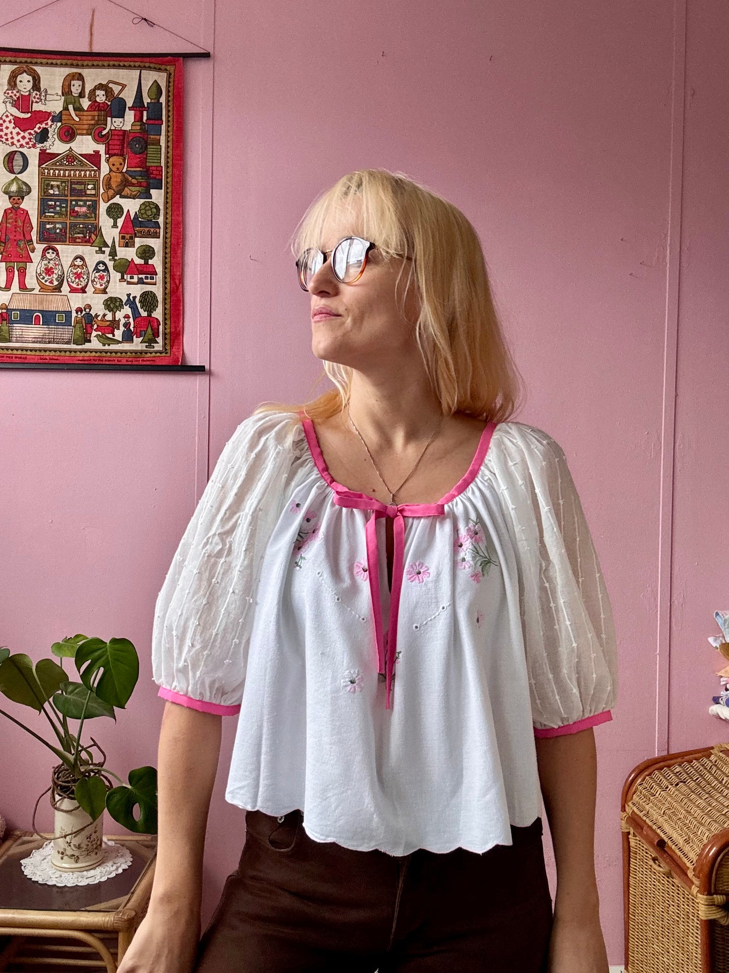White blouse with pink binding
