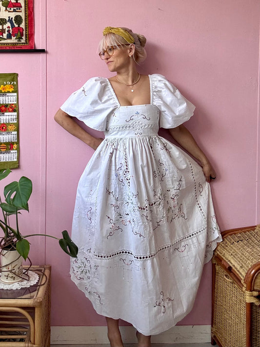 White maxi dress with embroidery and lace