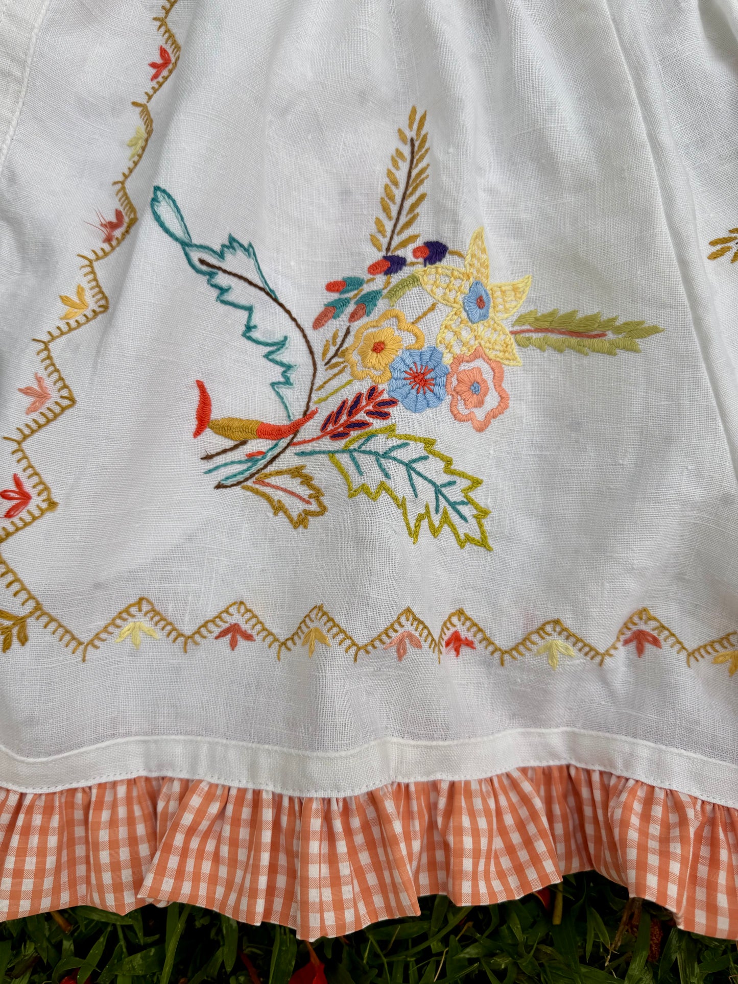 Linen floral shorts with orange gingham frill