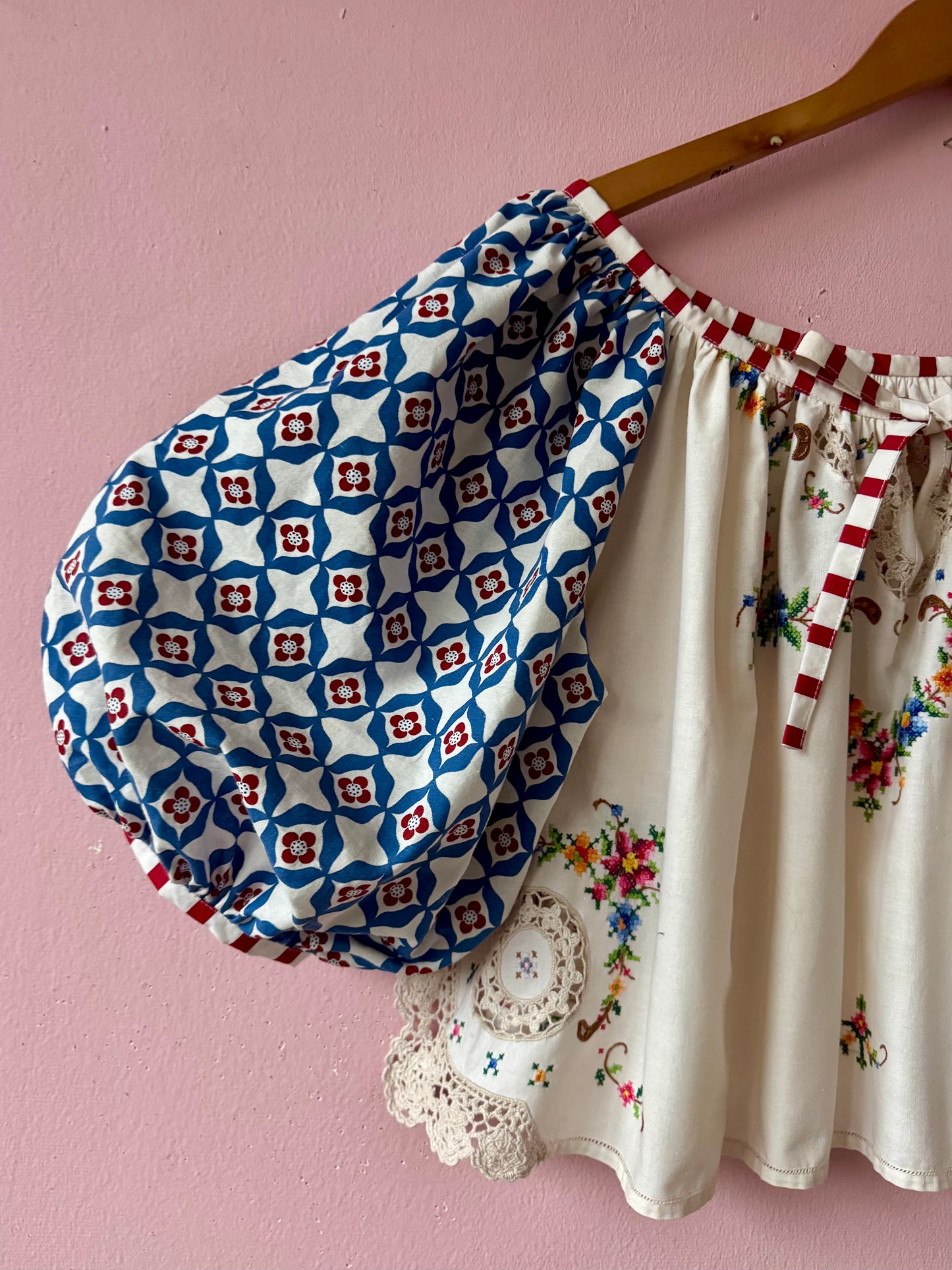 Embroidery and lace blouse with red stripes binding