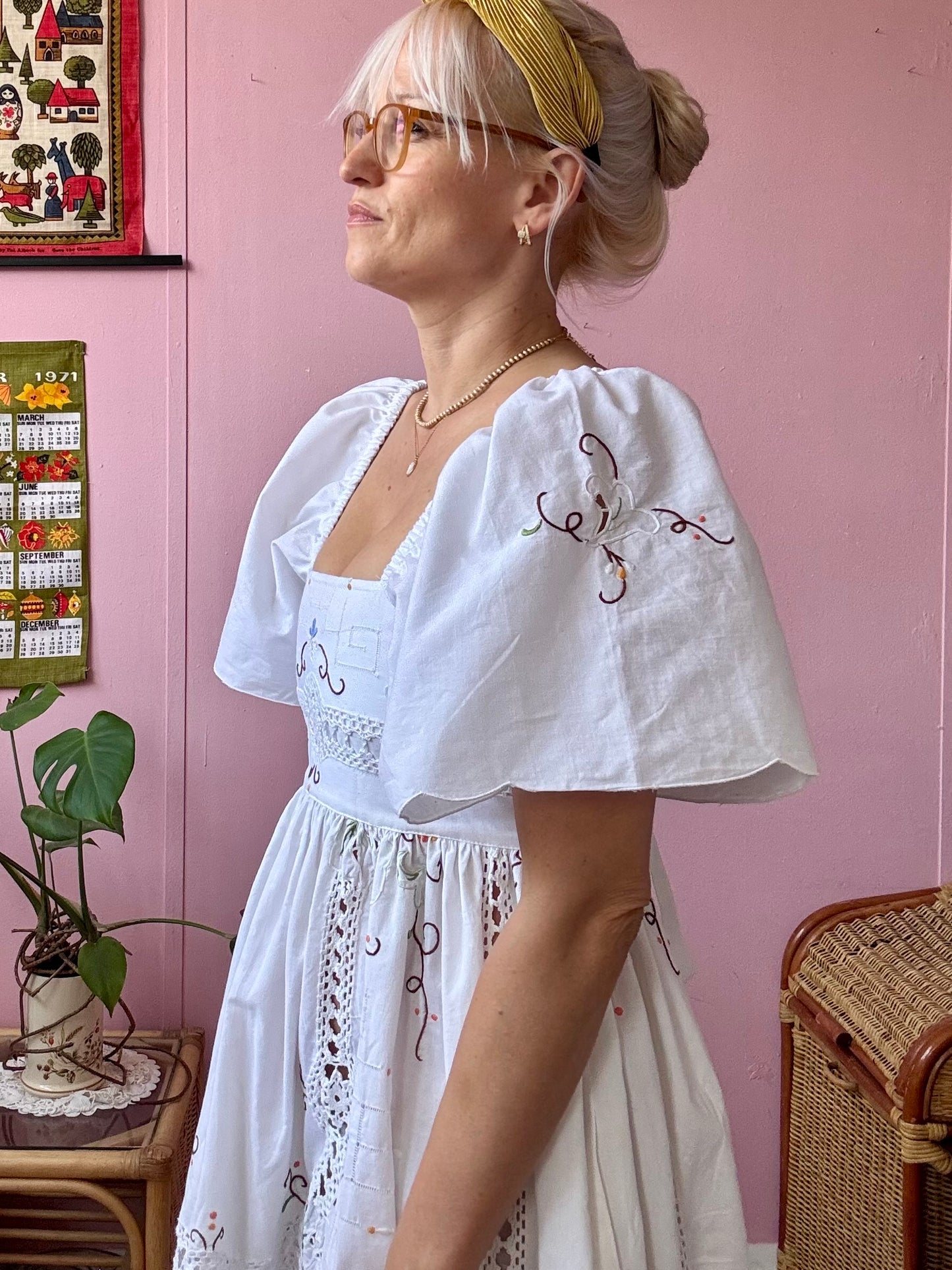 White maxi dress with embroidery and lace