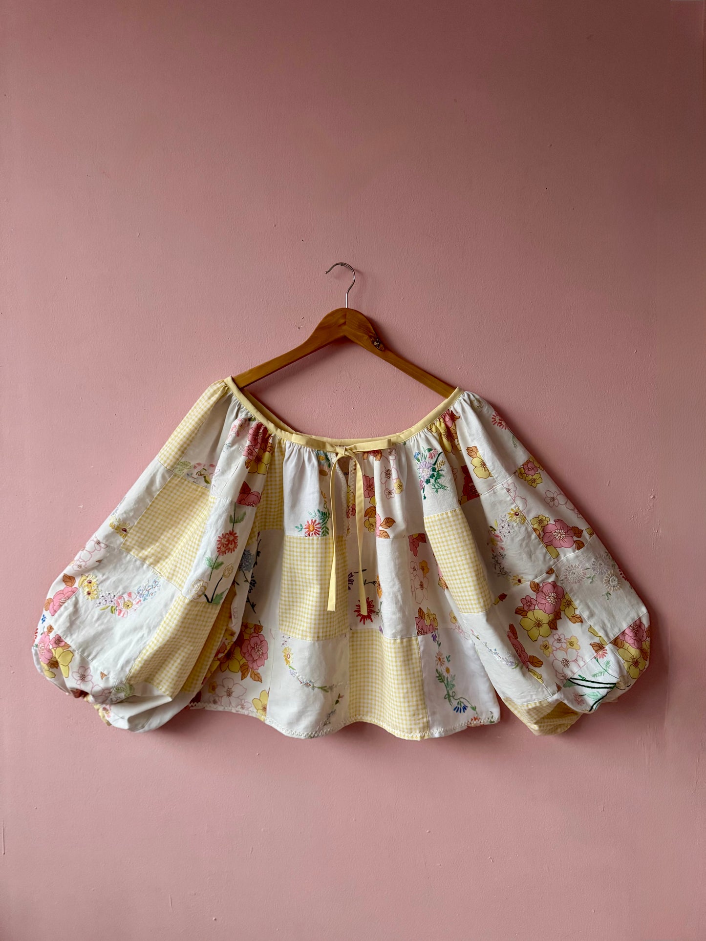 Yellow patchwork blouse with long sleeves