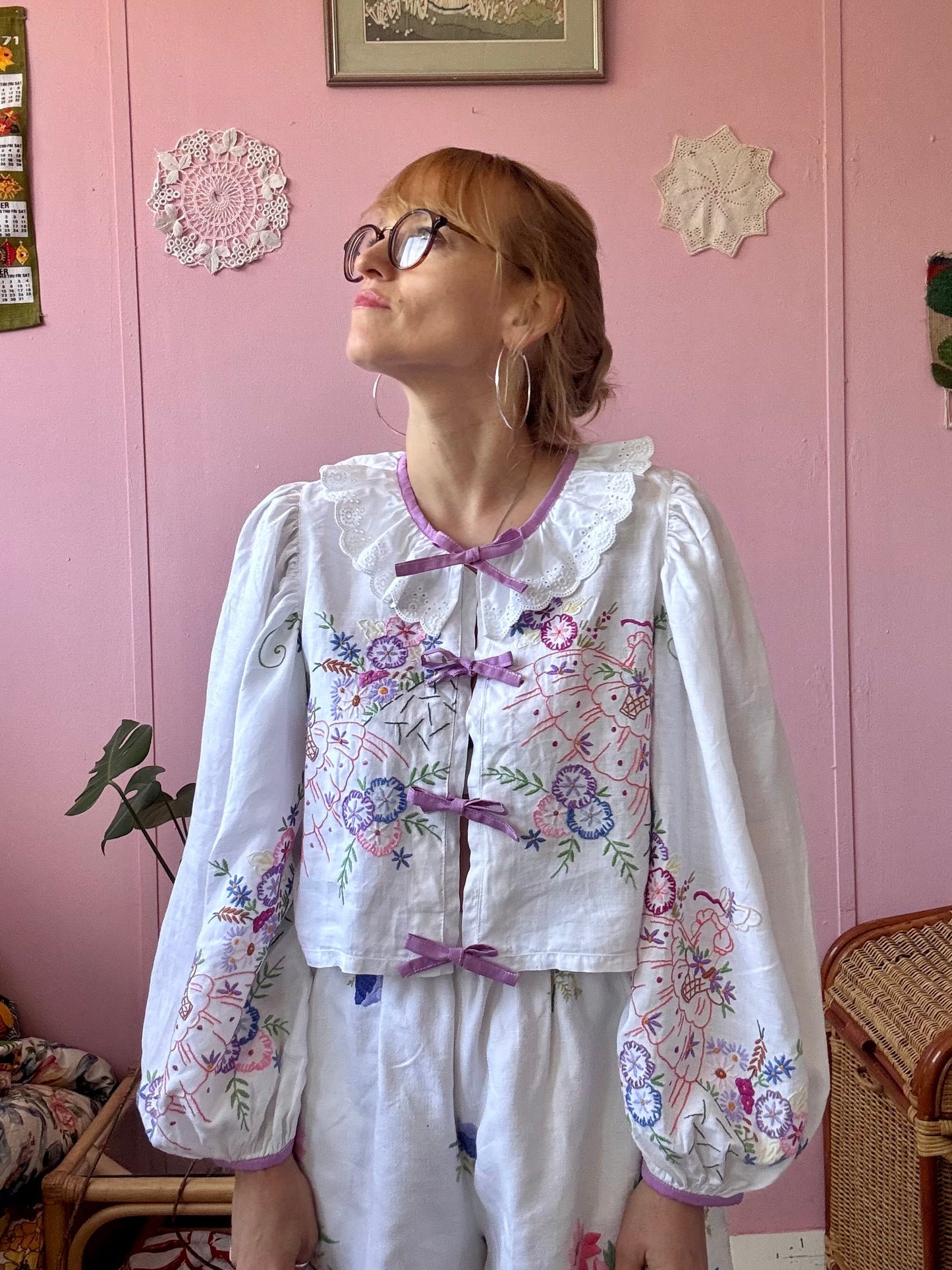 Blouse with lace neckline and lilac trimming
