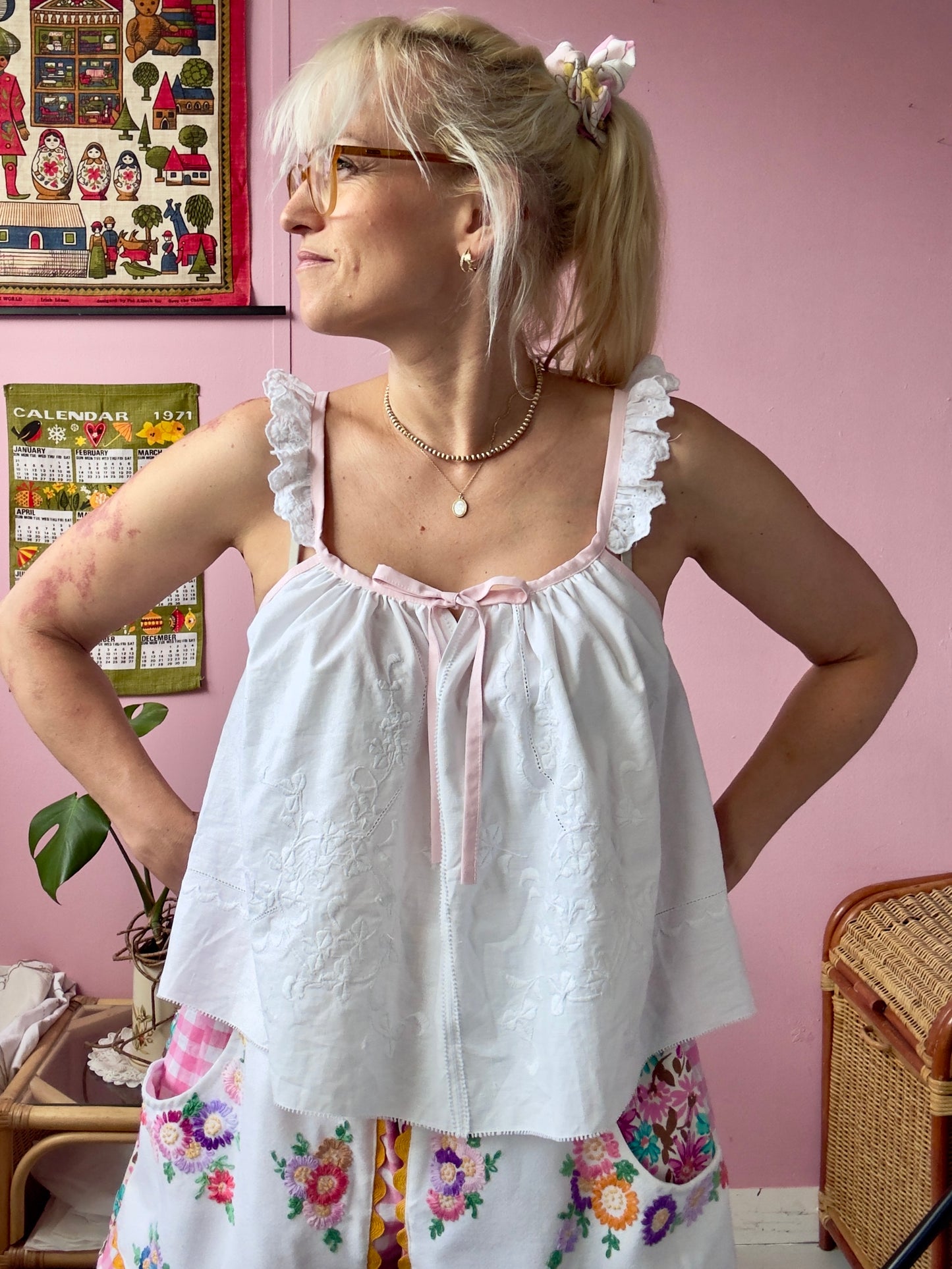 White top with pink straps