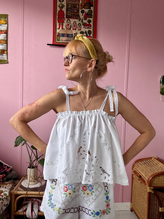 Summer top with embroidery and lace straps