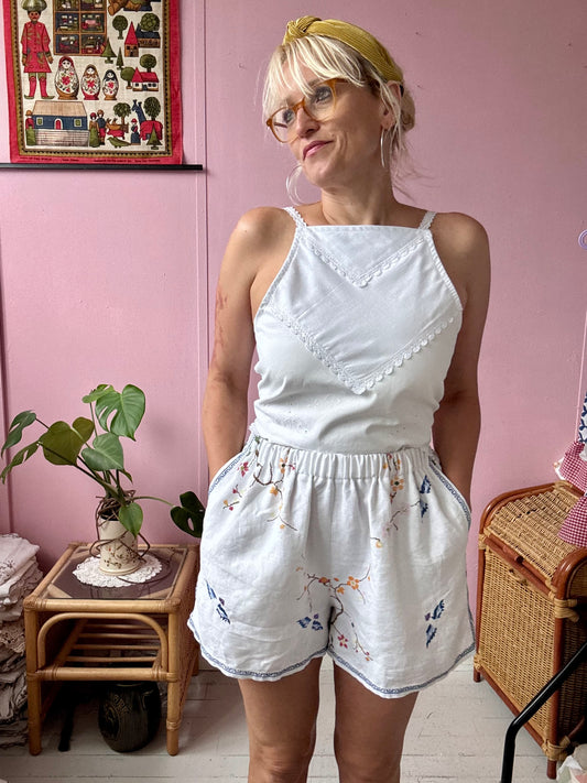 Linen shorts with cross stitching embroidery