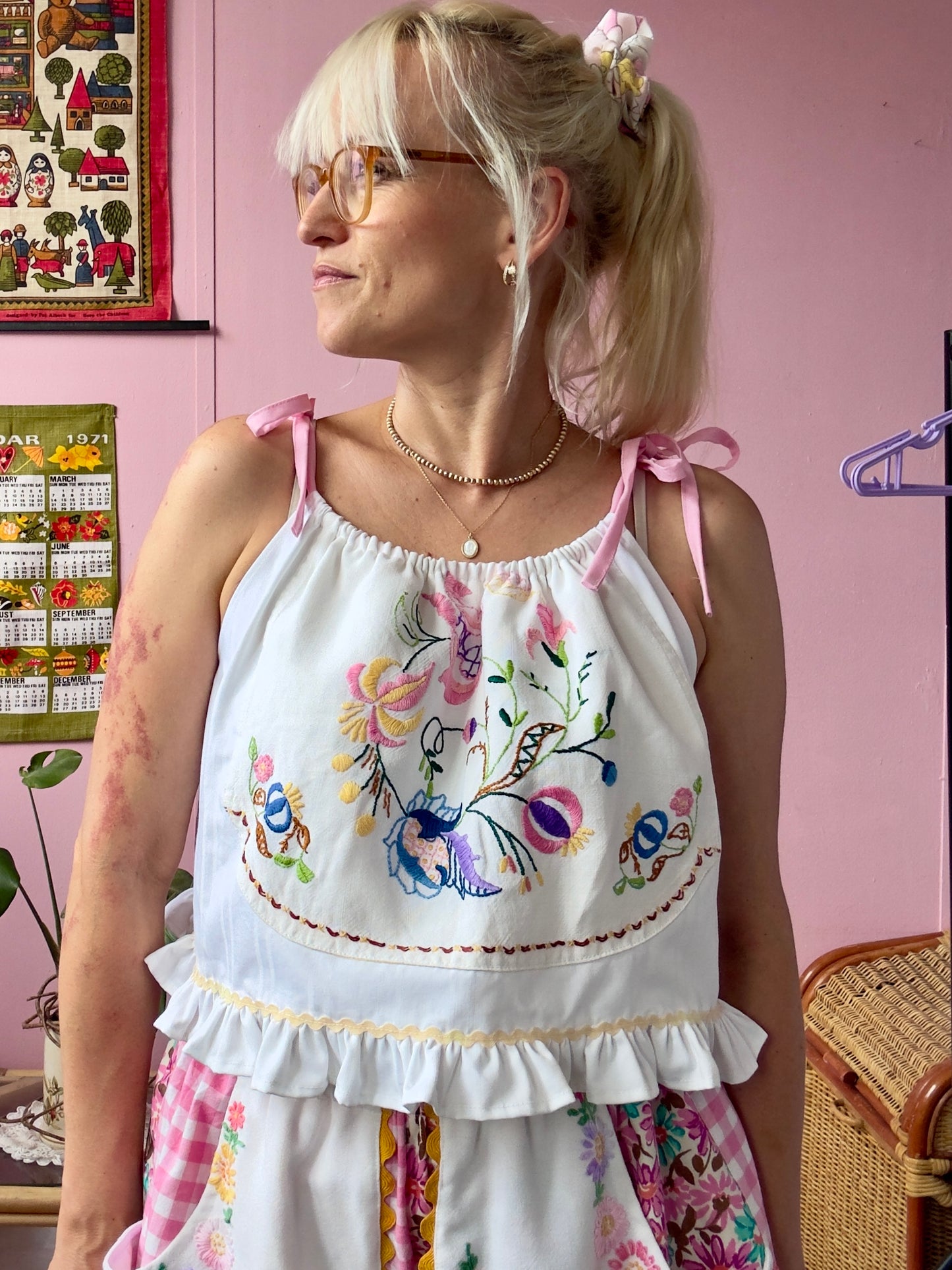 Embroidery top with pink straps