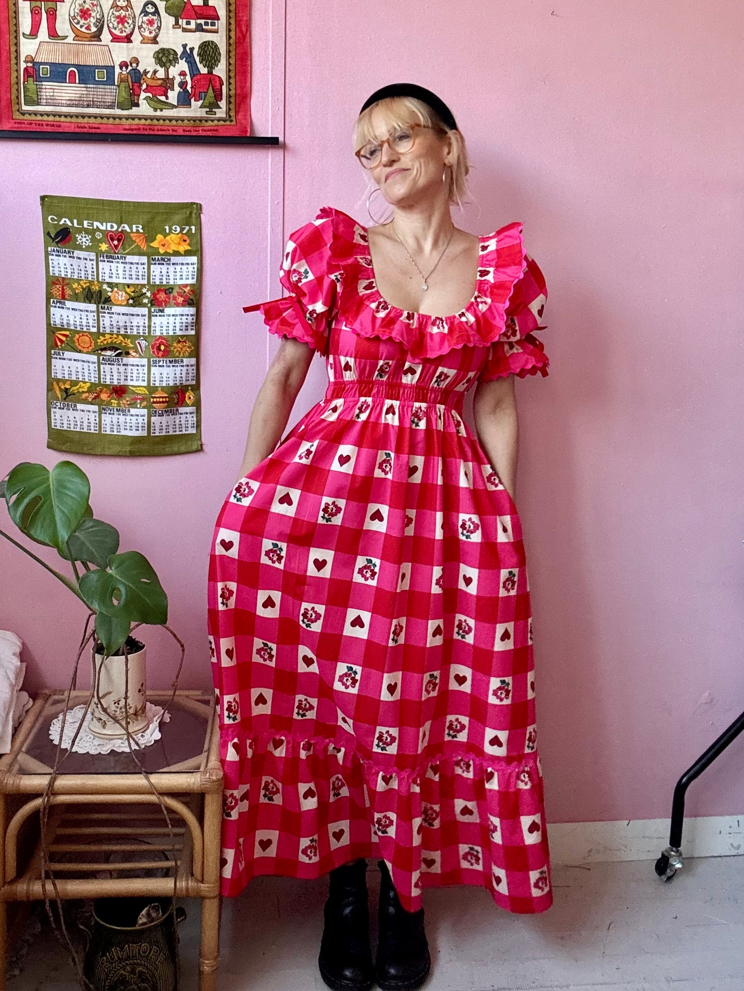 Pink/red dress with frills and ric rac