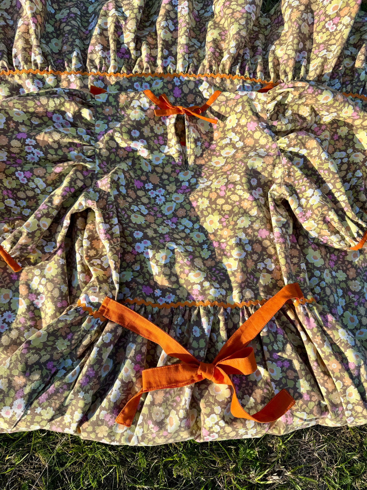 Floral maxi dress with orange frill