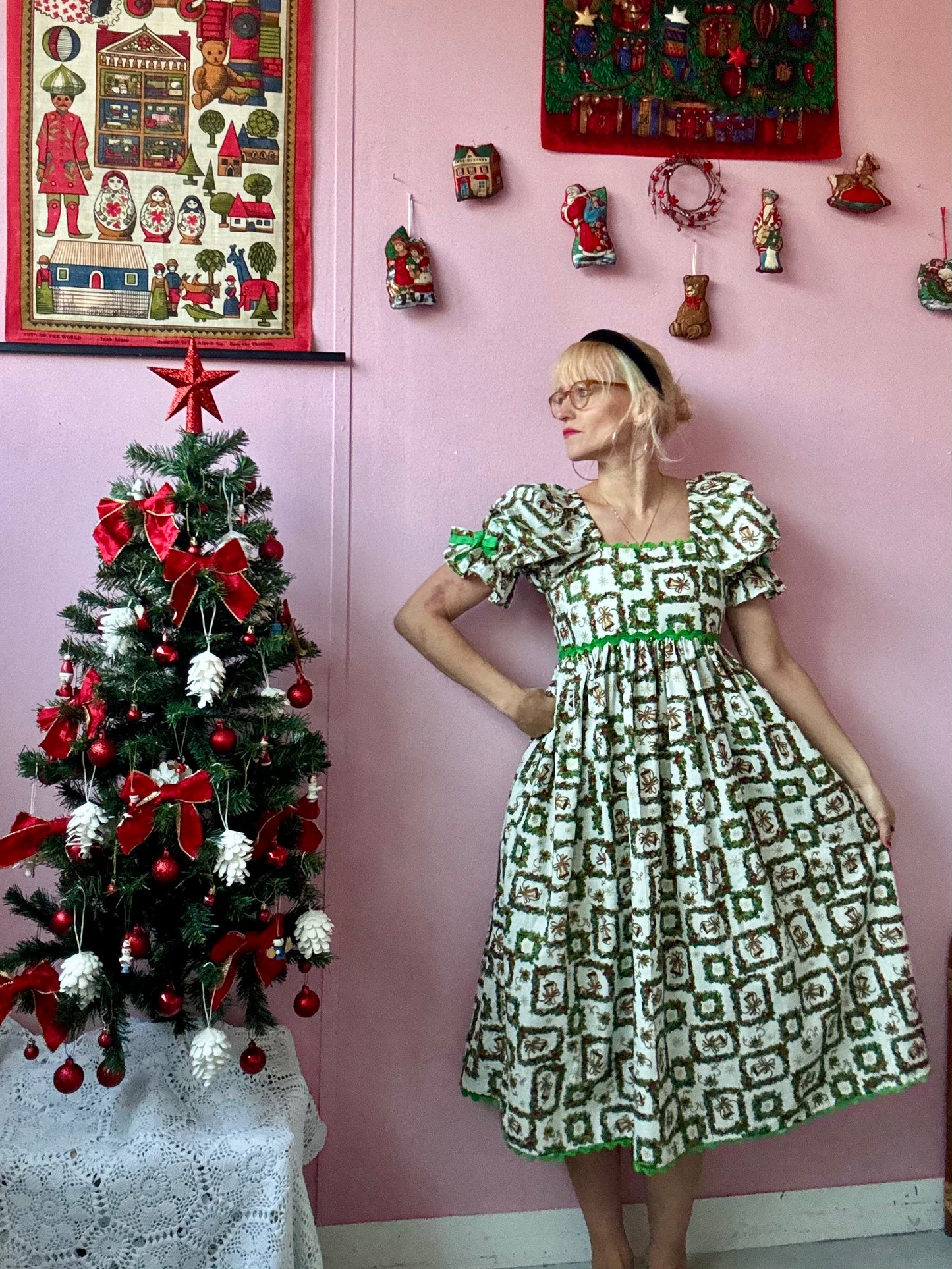 Christmas print midi dress with green ric rac and green bows
