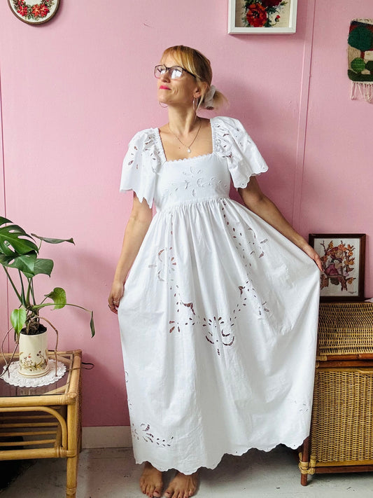 All white maxi dress with cut out embroidery