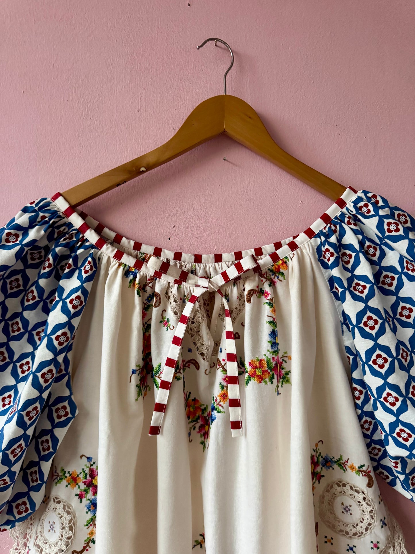 Embroidery and lace blouse with red stripes binding