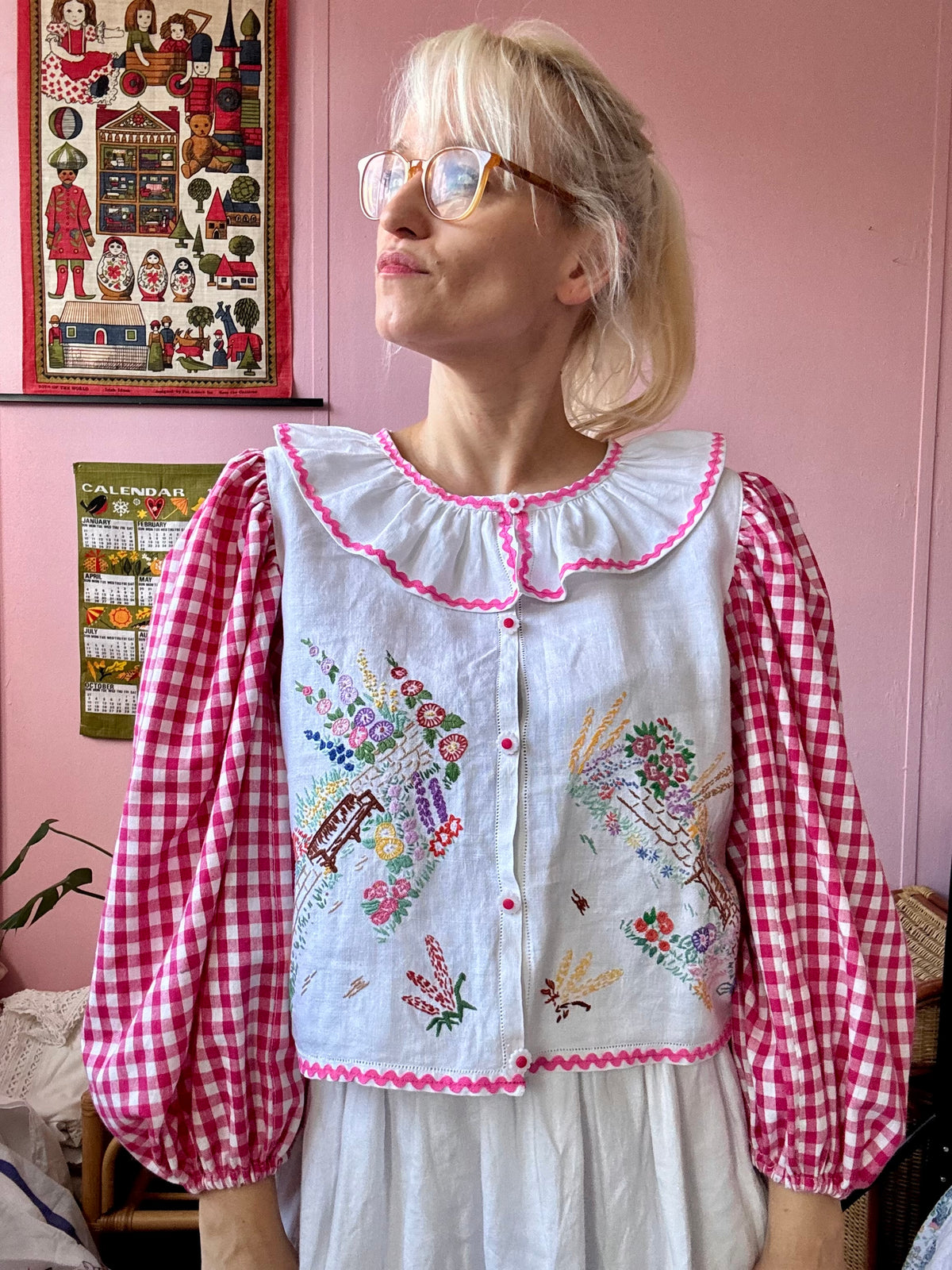 Pink gingham and floral blouse with neckline frill