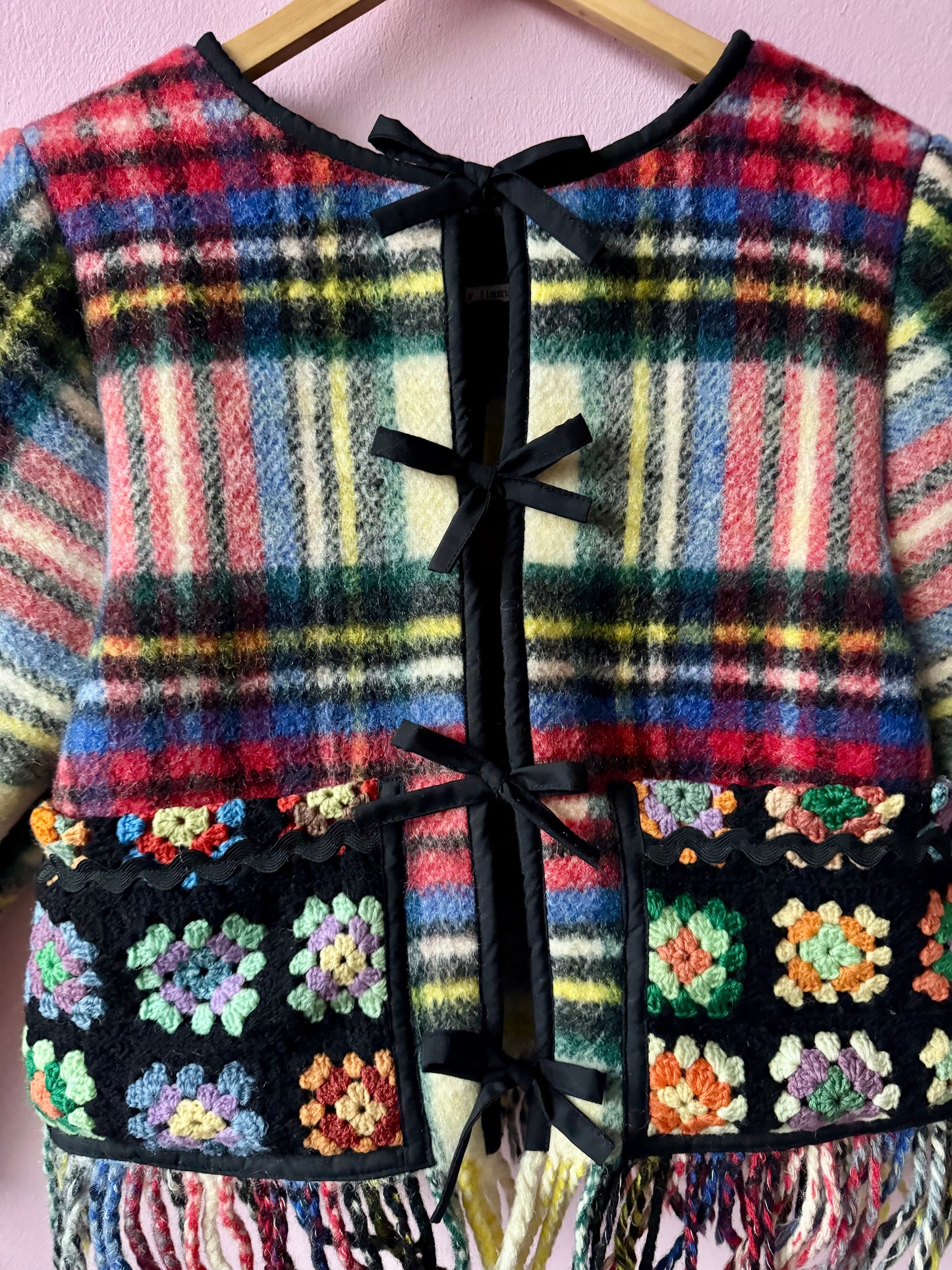 Wool jacket with patchwork pockets