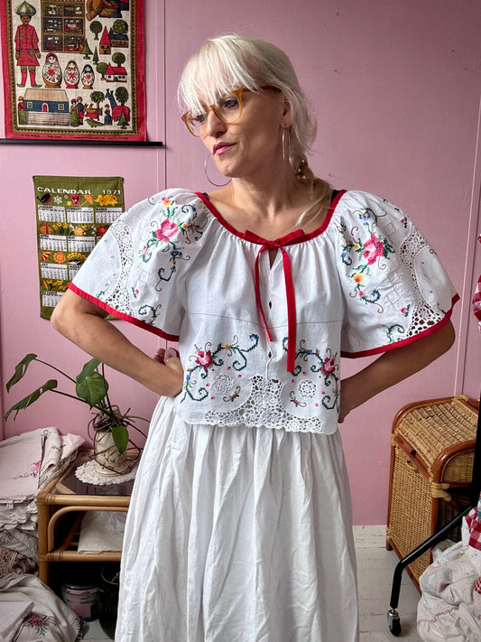 Embroidery blouse with red trim