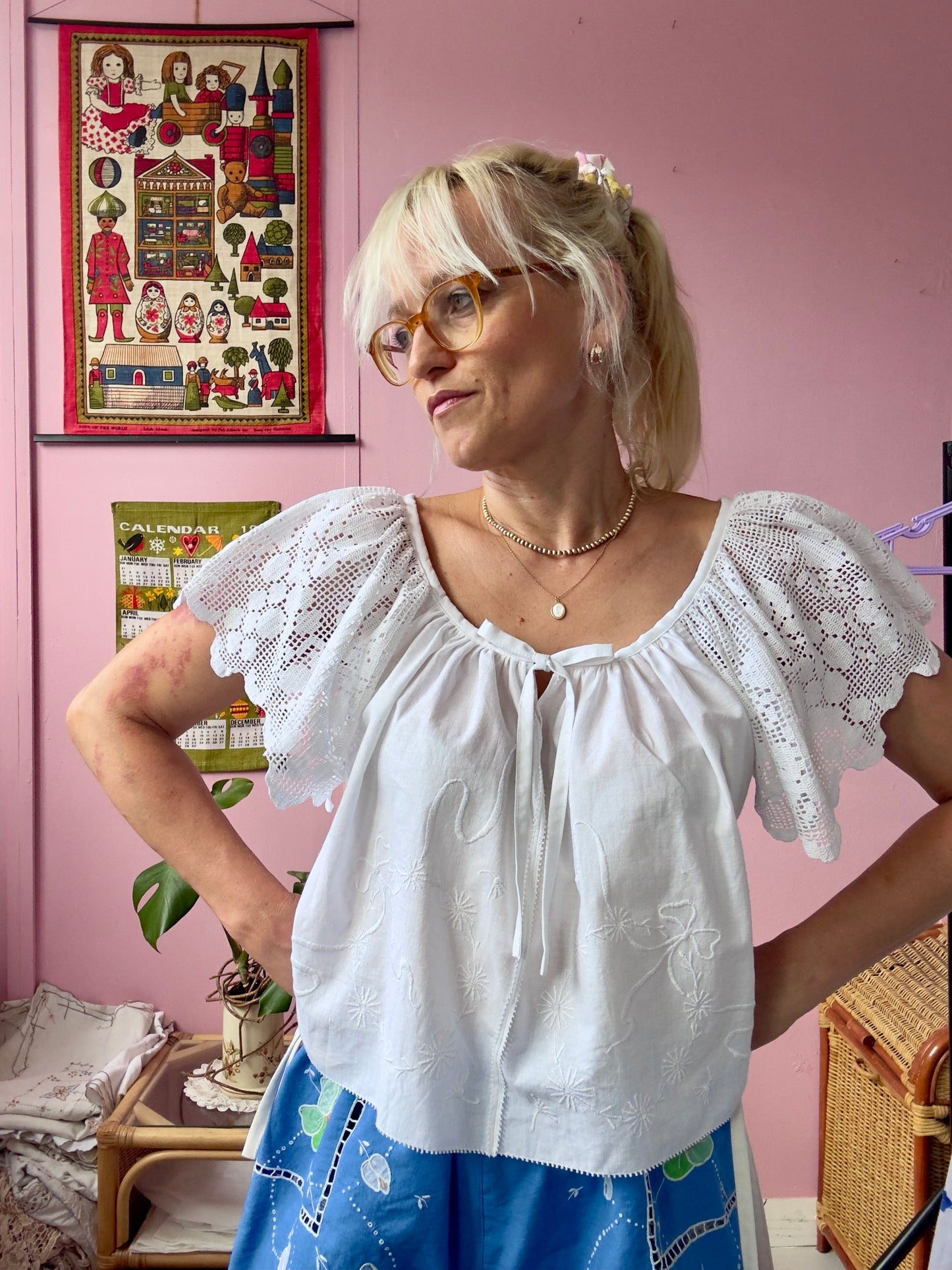 White blouse with lace sleeves