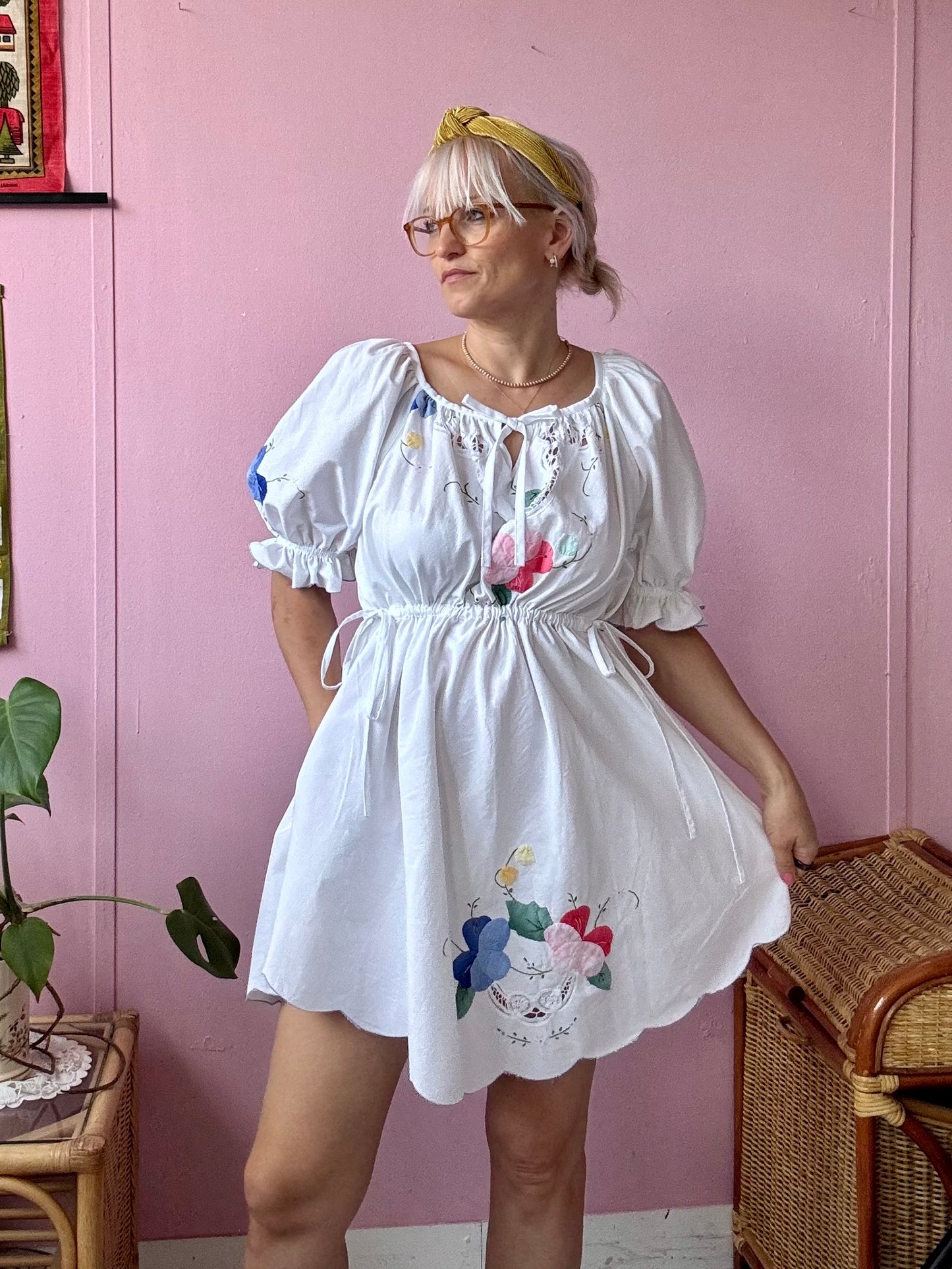 White mini dress with floral appliqués