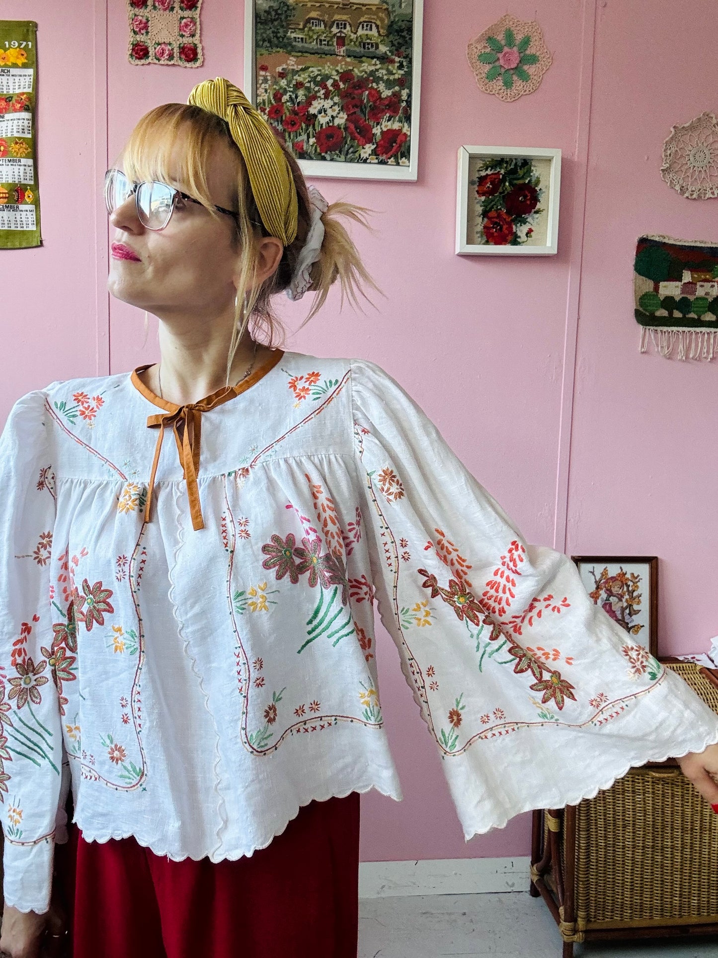 Linen blouse with floral embroidery and wide sleeves