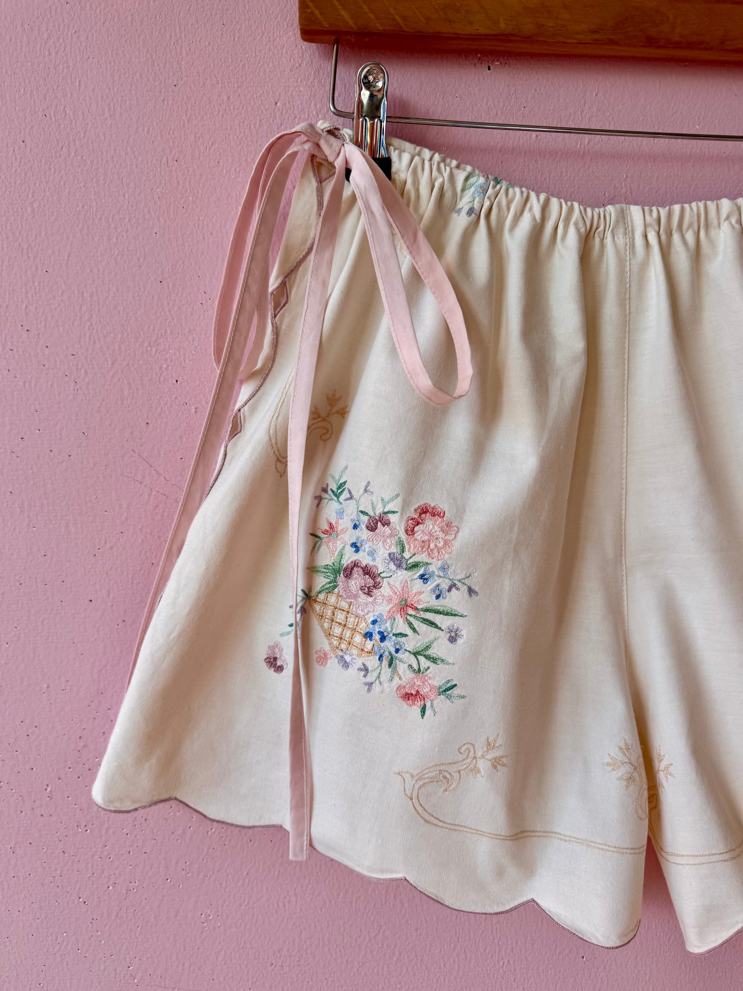 Cream shorts with pink bows