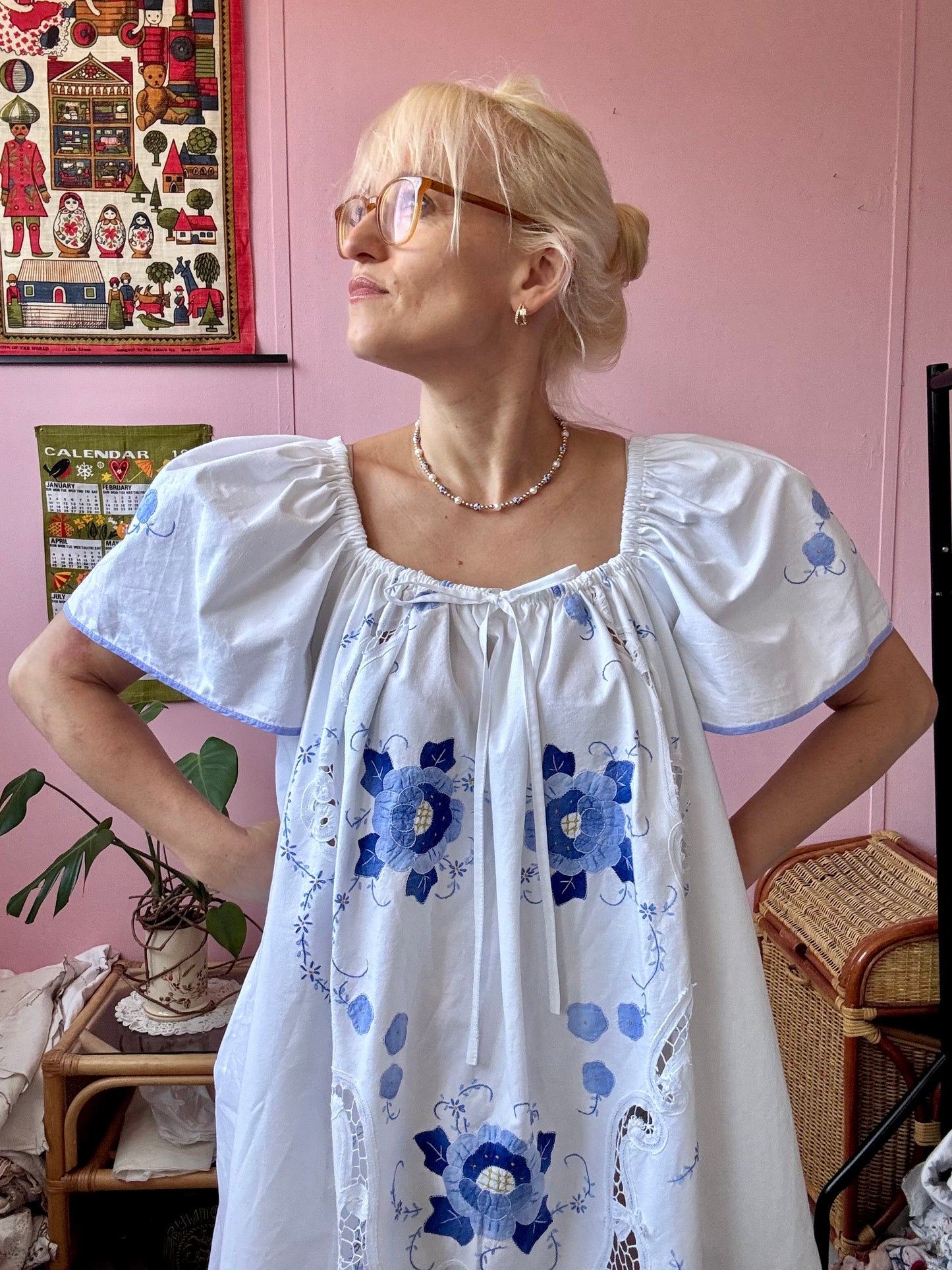 Maxi dress with blue floral appliqués