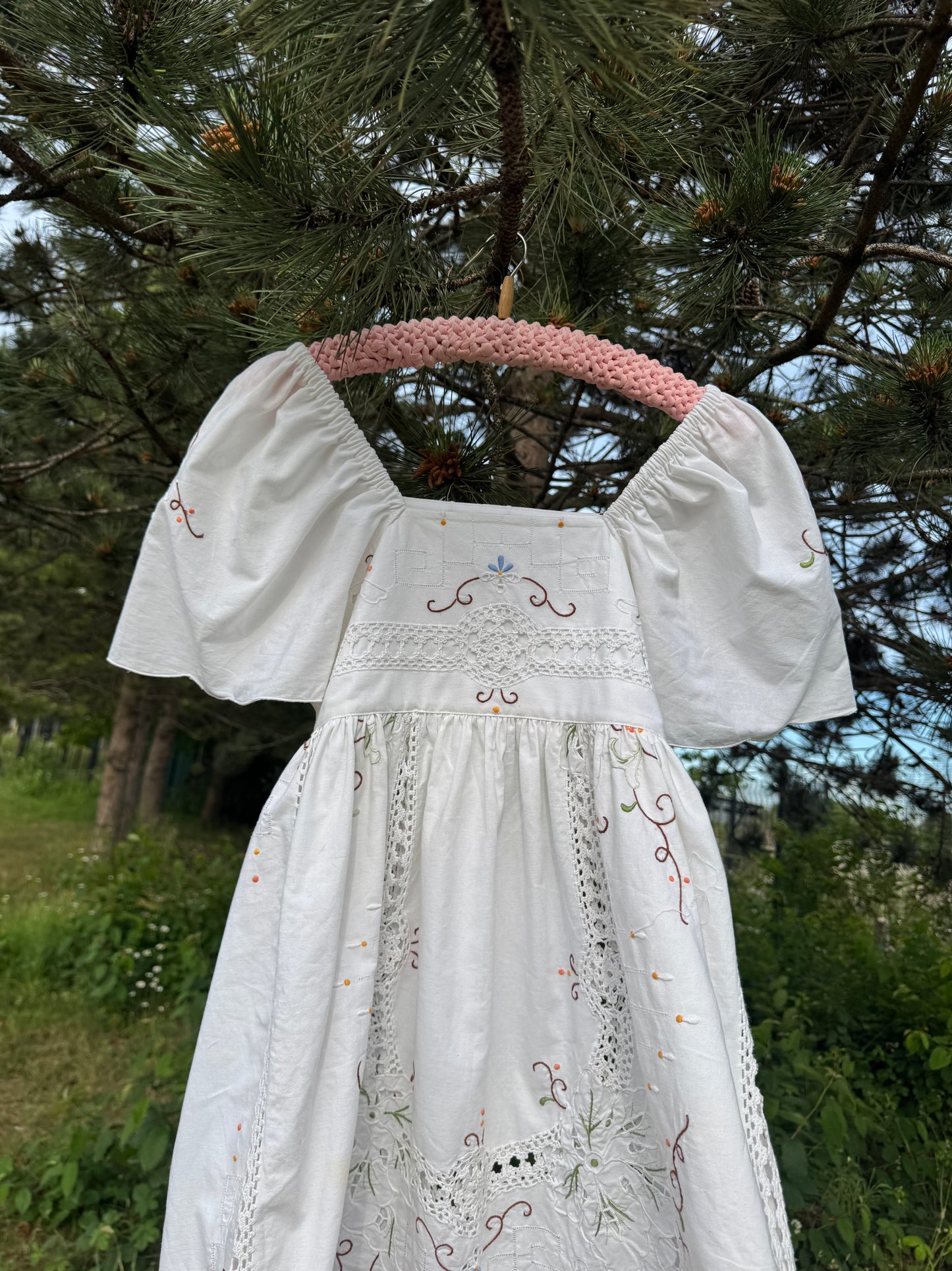 White maxi dress with embroidery and lace