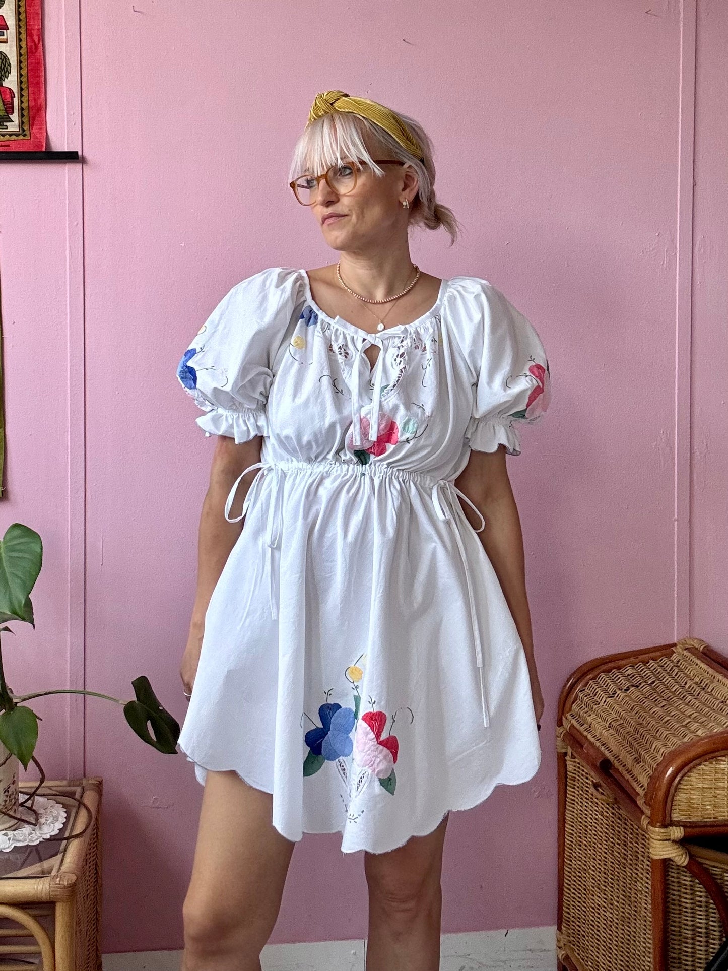 White mini dress with floral appliqués