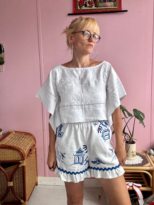 All white basic top with floral hand embroidery