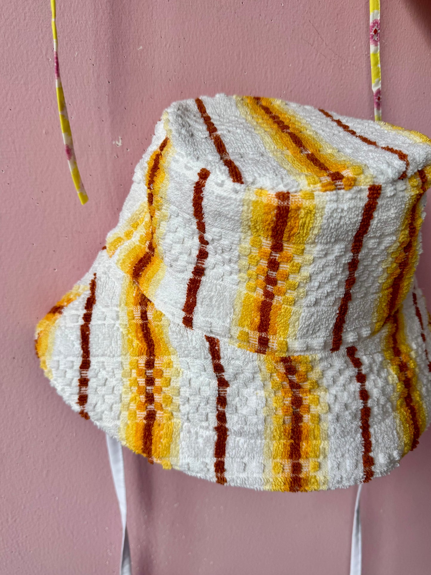 Orange/brown/yellow towel bucket hat