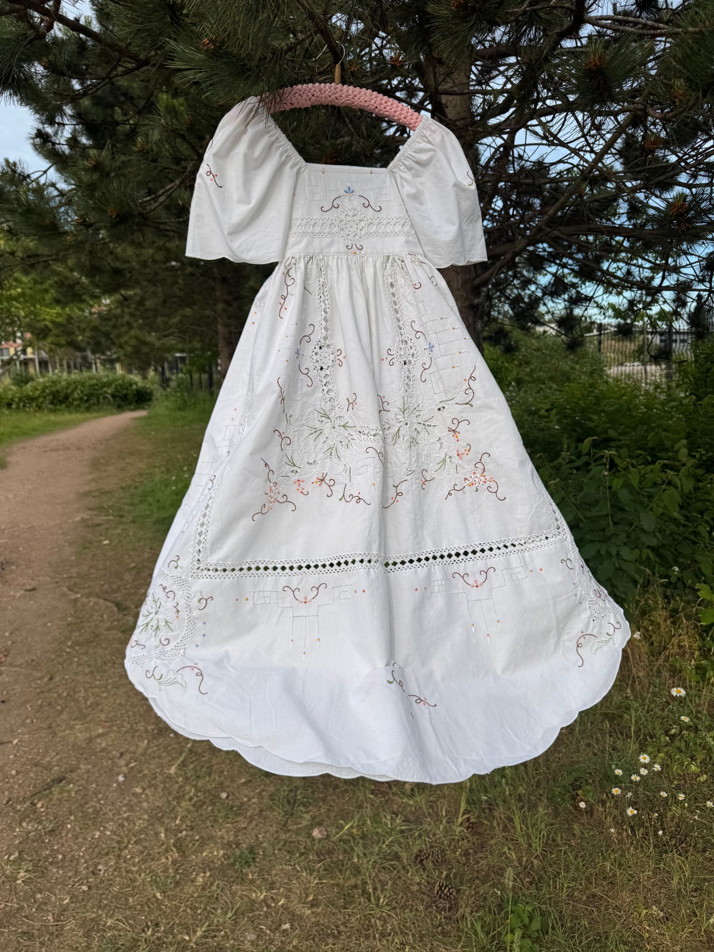 White maxi dress with embroidery and lace