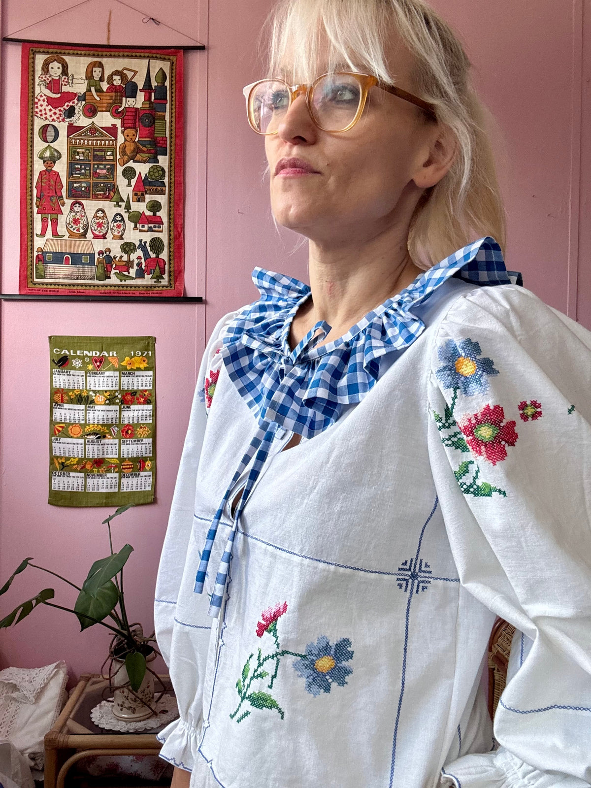 White blouse with blue ric rac neckline frill