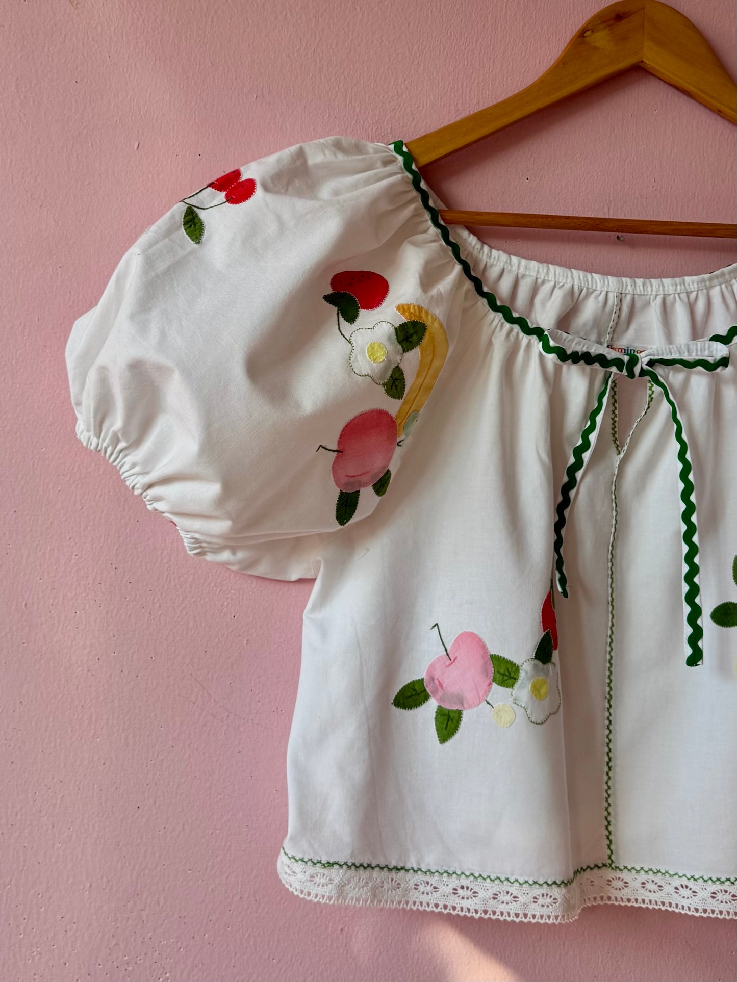 Fruity blouse with green ric rac