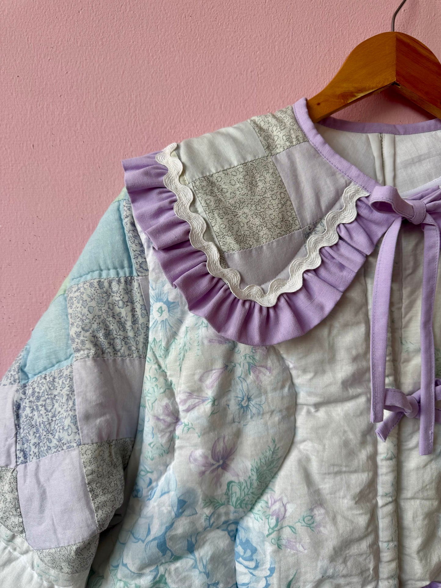 Light pastel patchwork jacket with lilac trims
