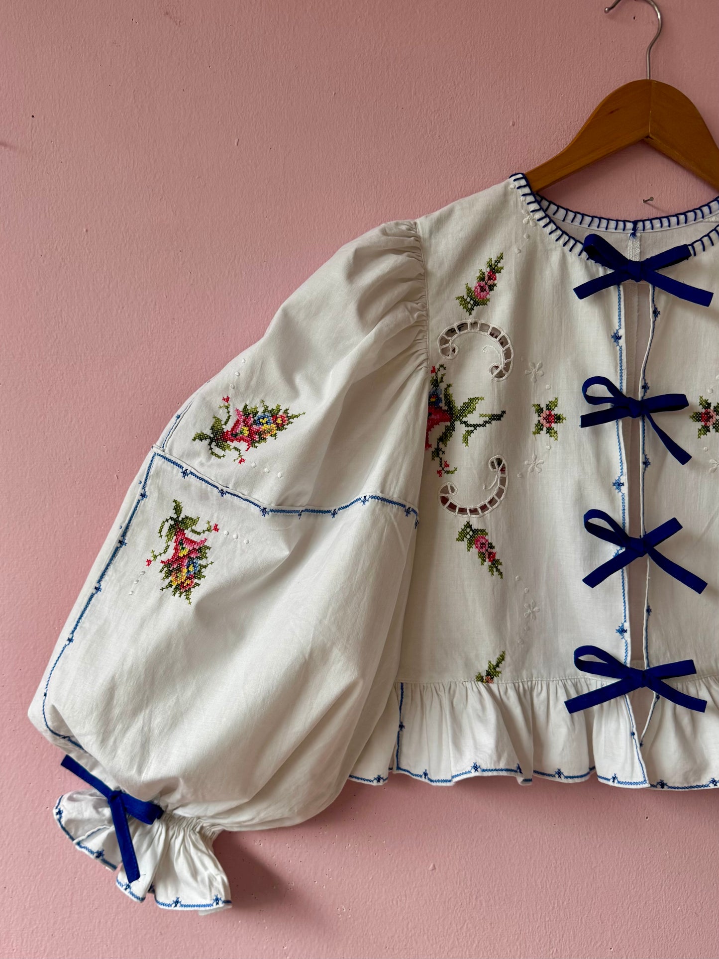 White embroidery blouse with blue bows