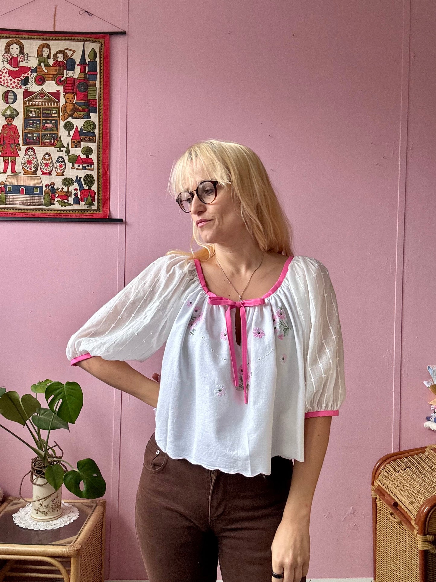White blouse with pink binding
