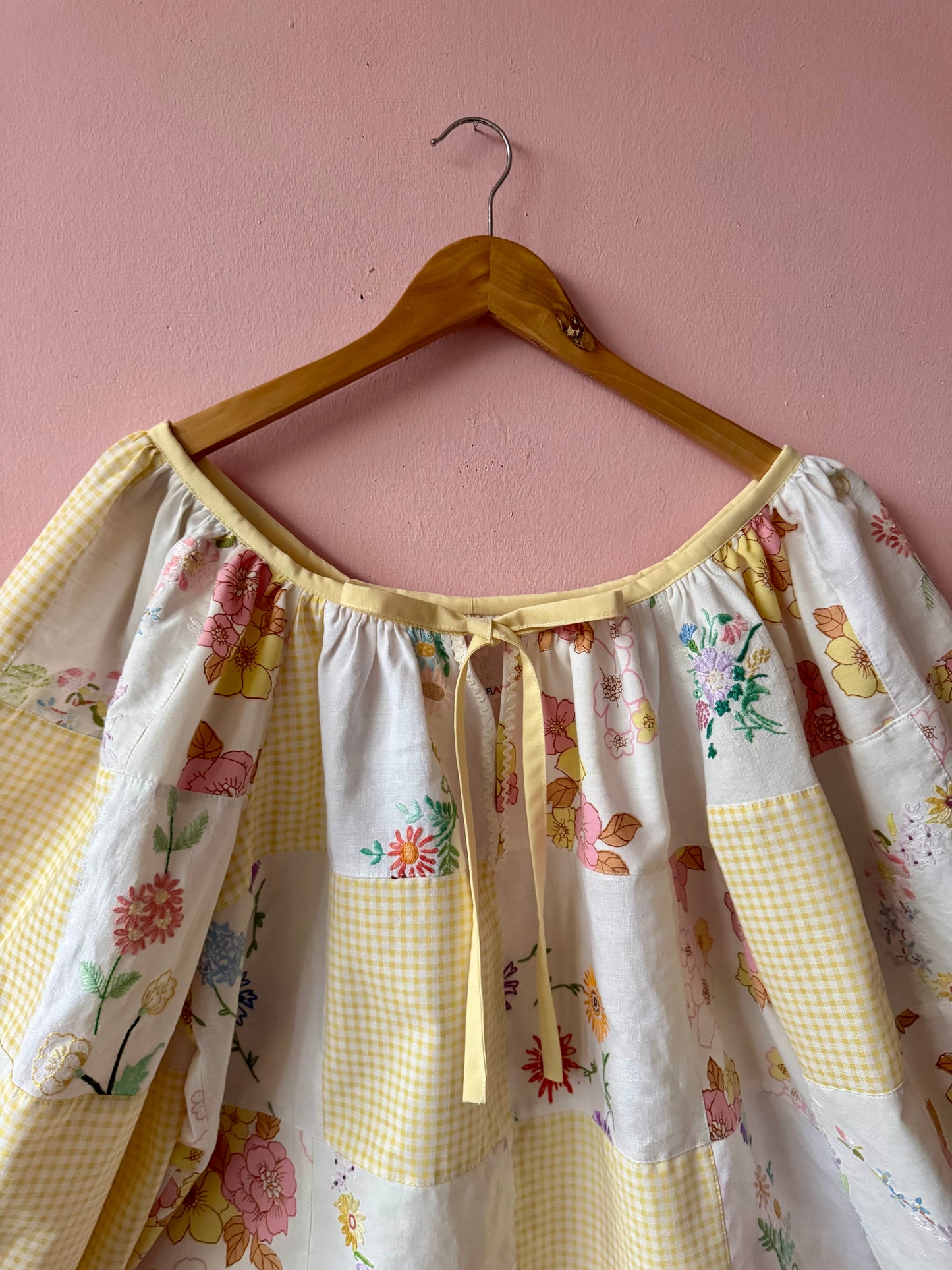 Yellow patchwork blouse with long sleeves