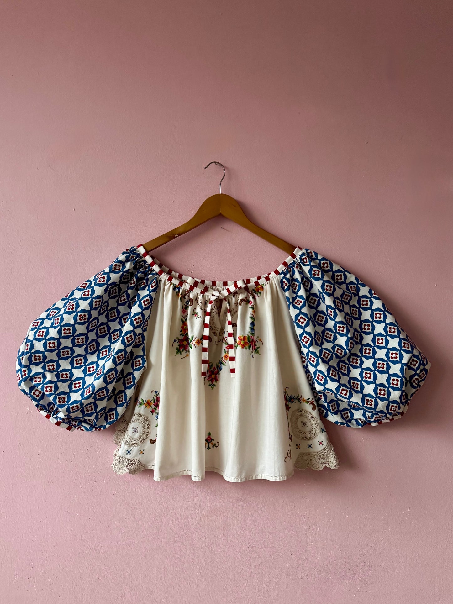 Embroidery and lace blouse with red stripes binding