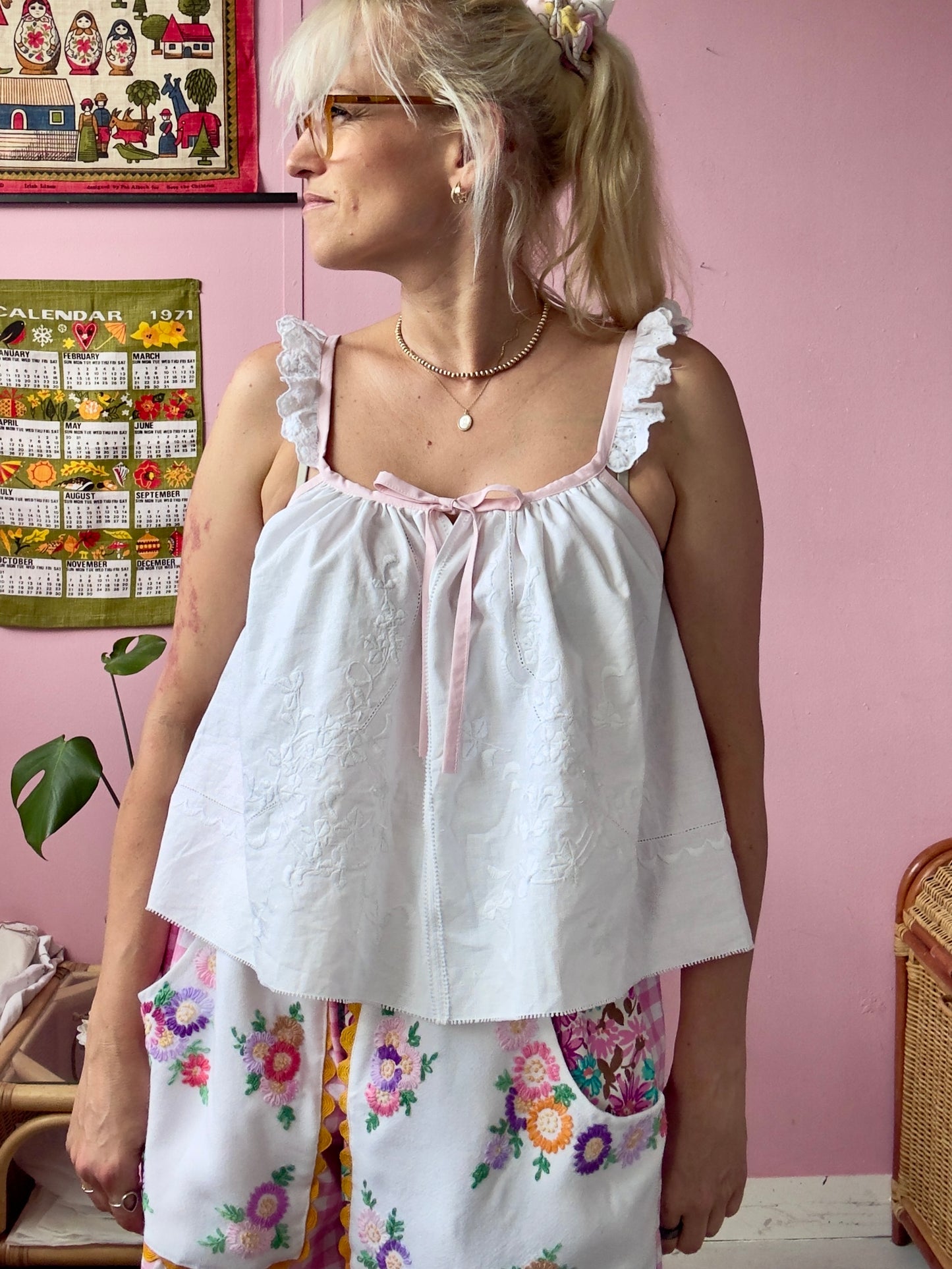 White top with pink straps