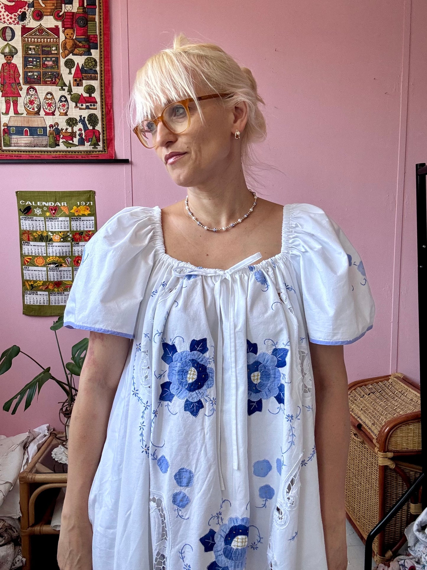 Maxi dress with blue floral appliqués