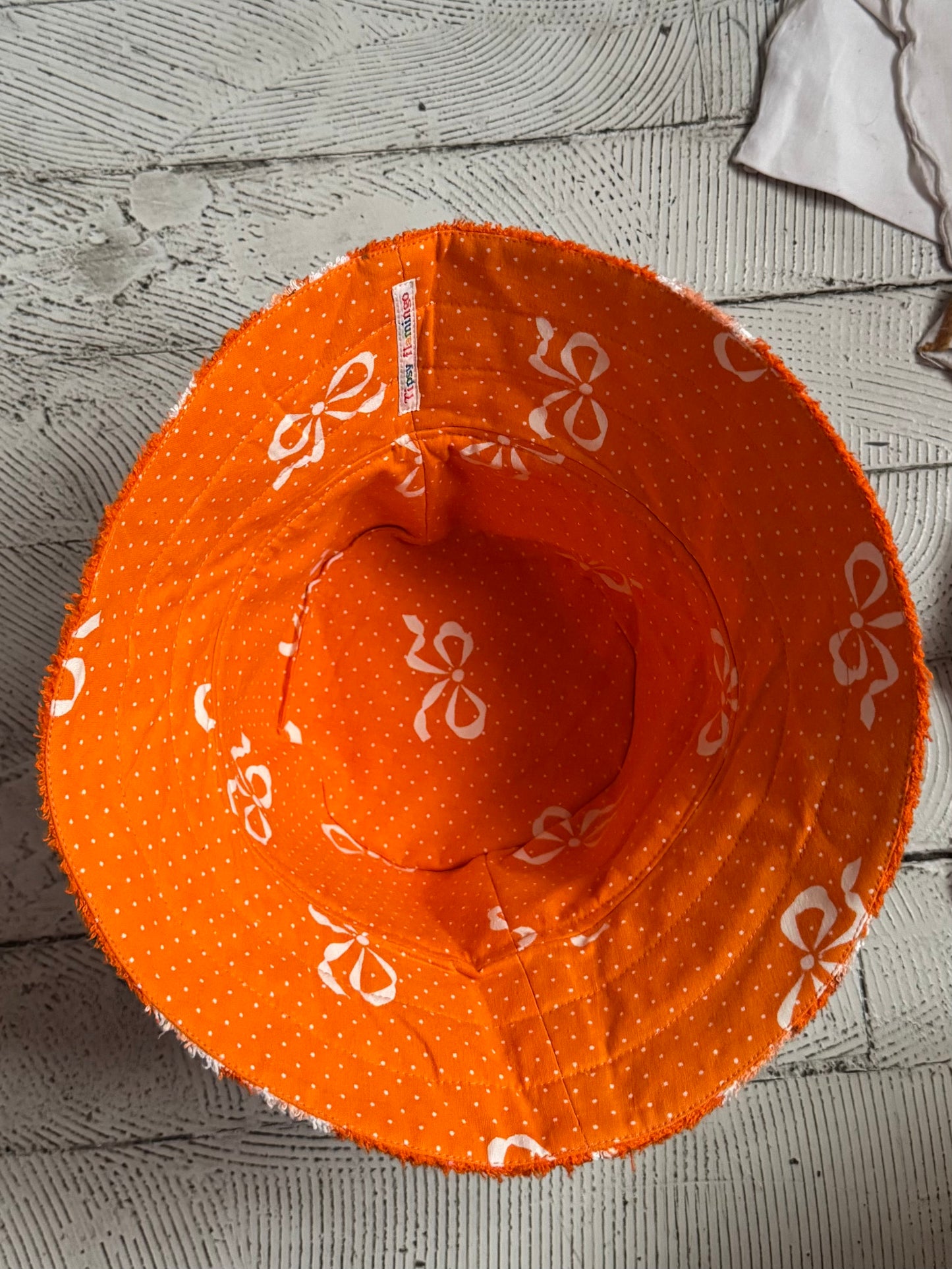 Orange floral bucket hat