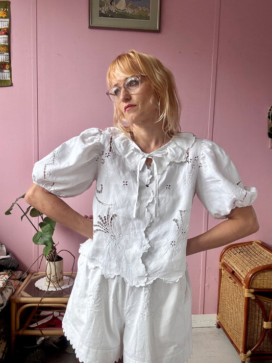 White floral blouse with neckline frill