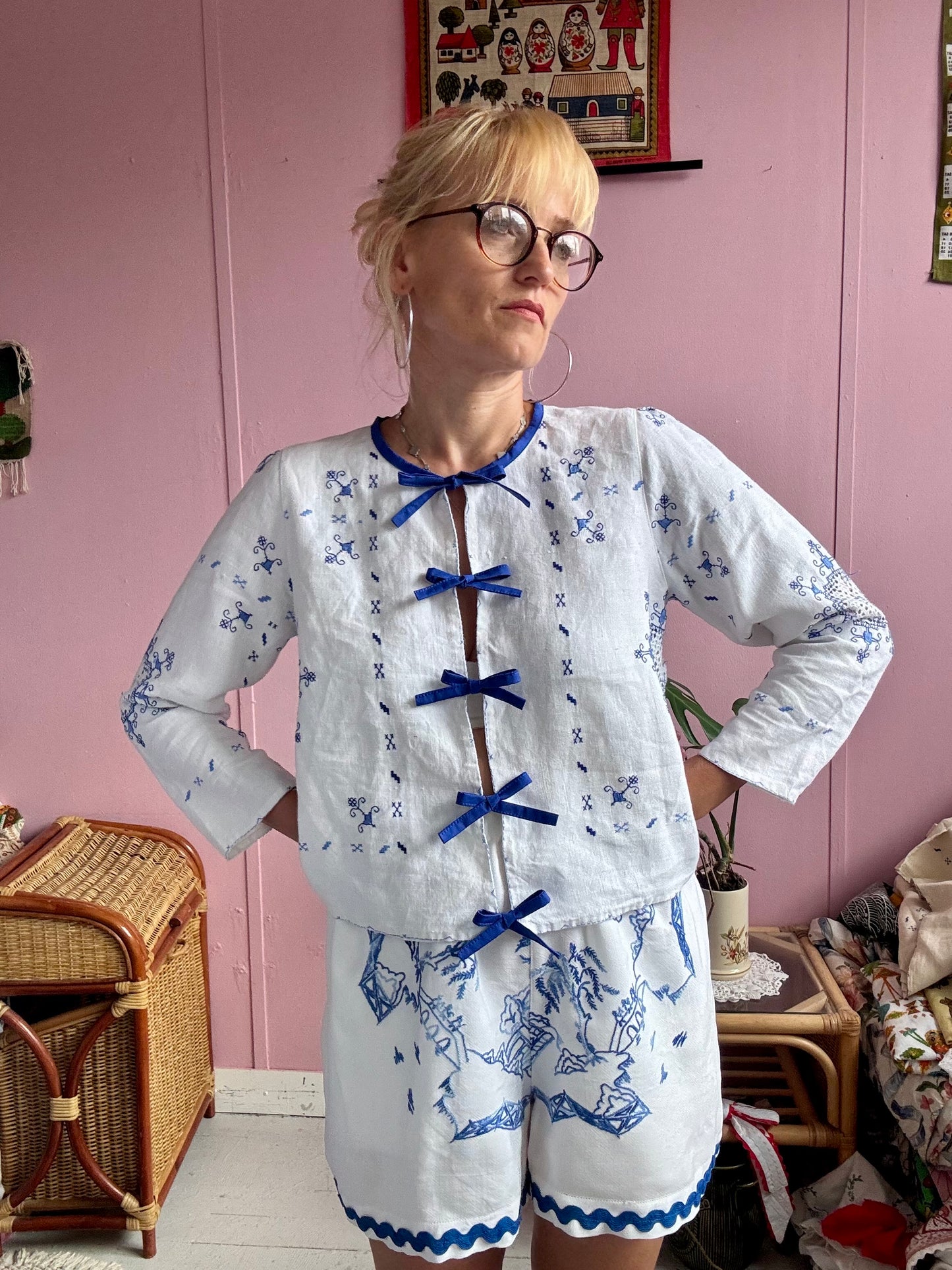 White linen blouse/light jacket with blue bows