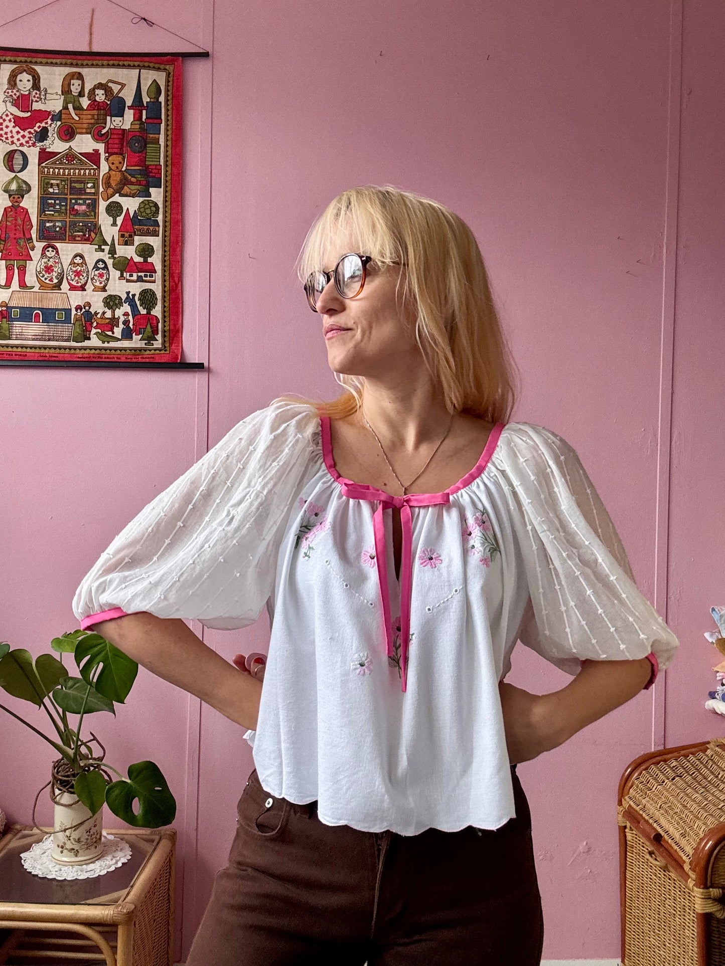 White blouse with pink binding