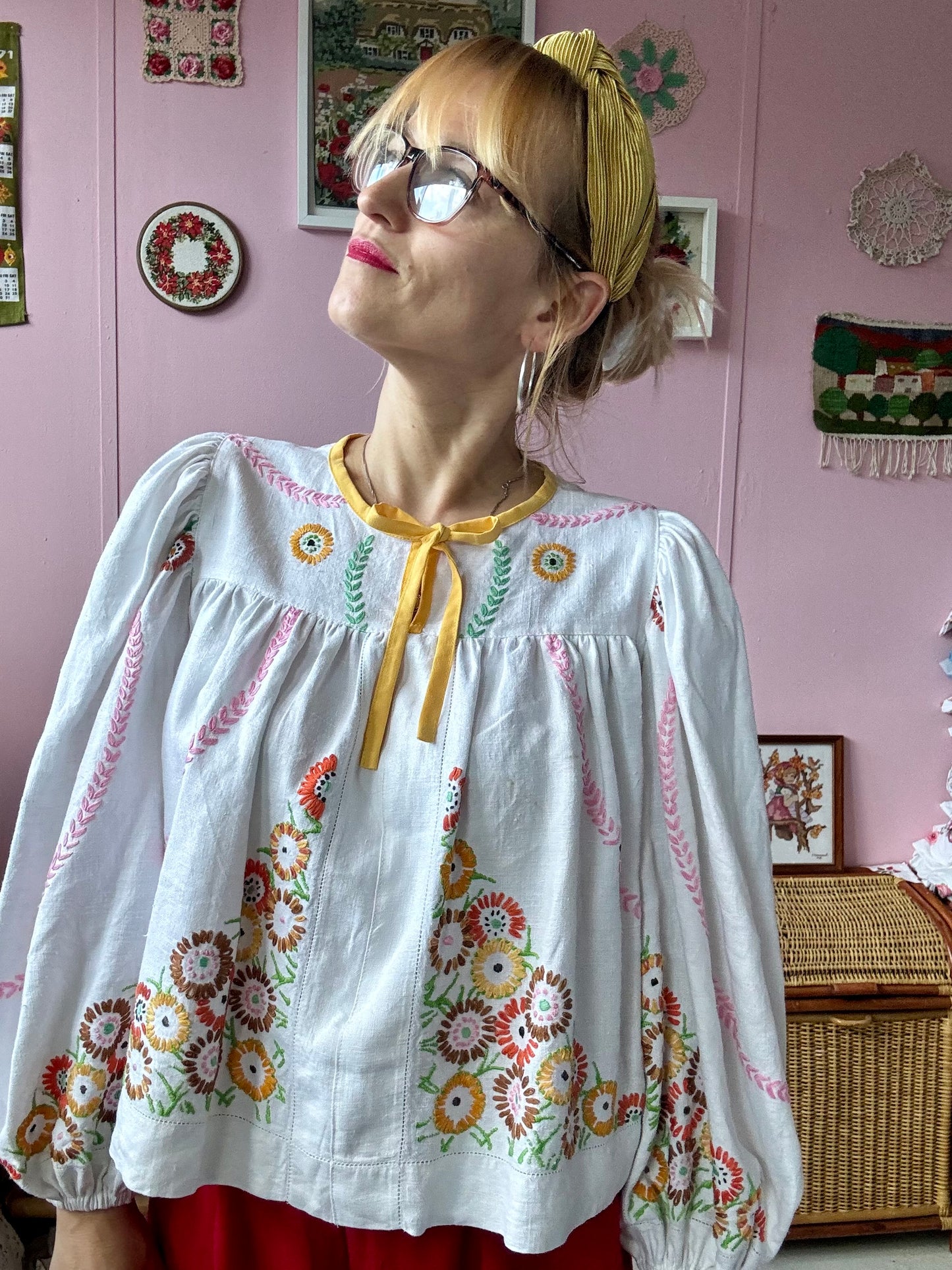 Linen blouse with floral embroidery and yellow binding