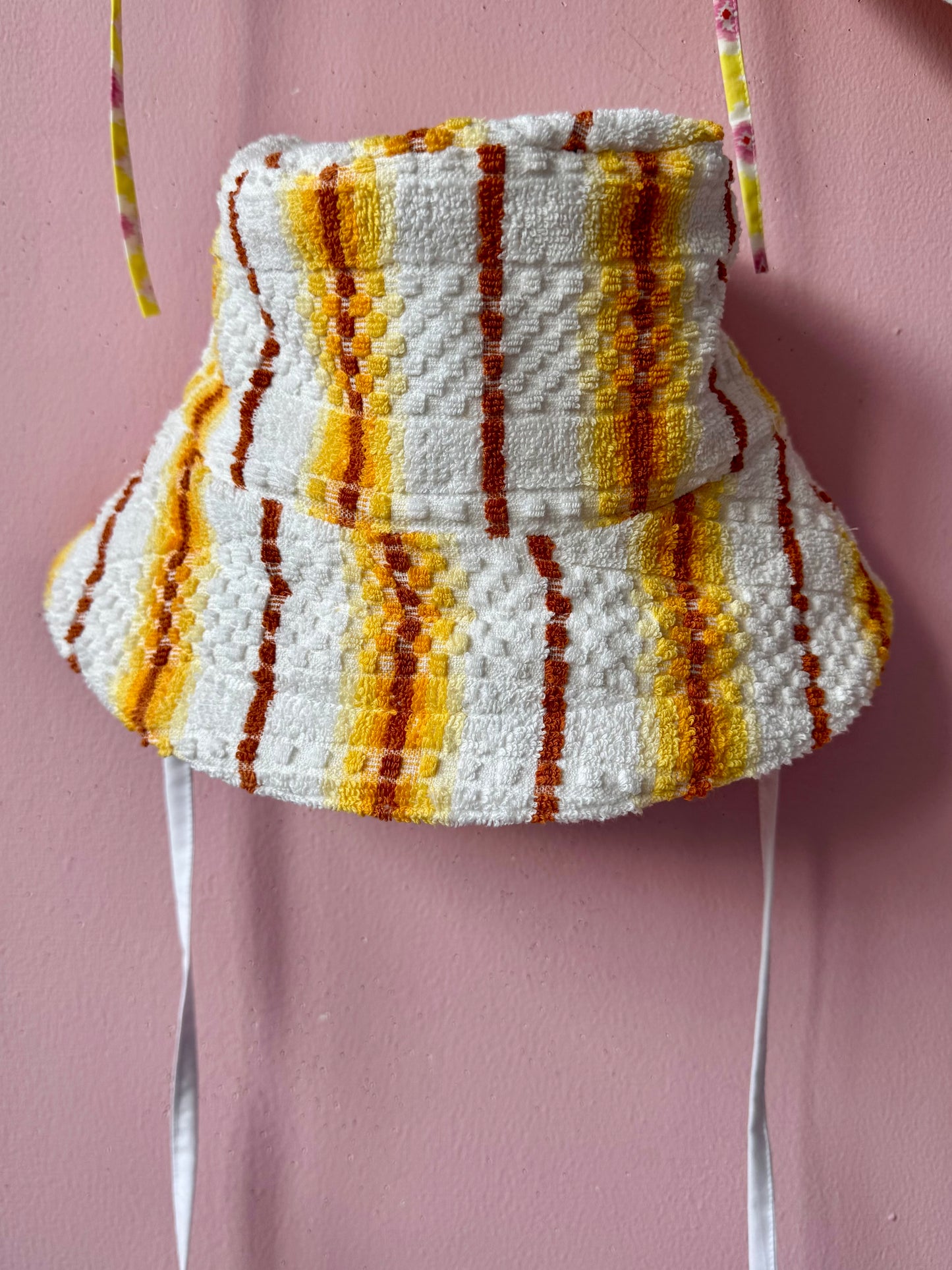 Orange/brown/yellow towel bucket hat